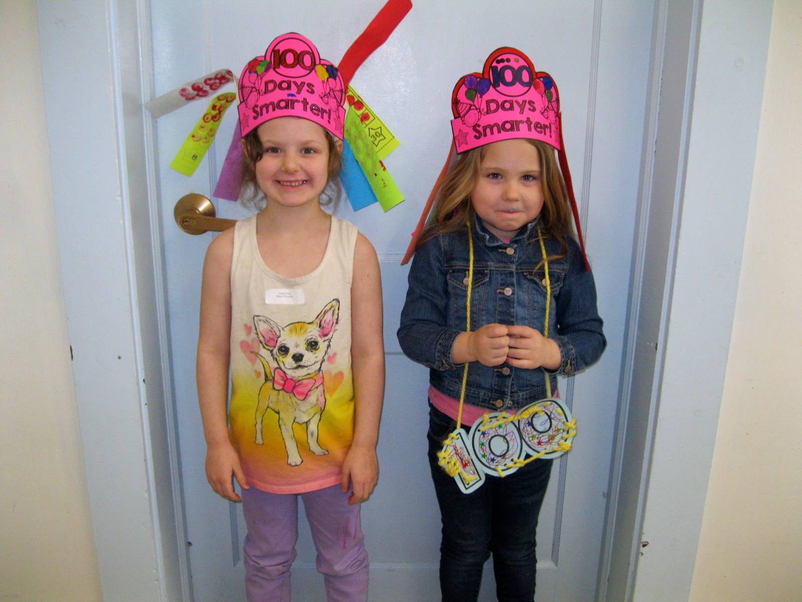2 Students with 100 day crowns and necklaces.