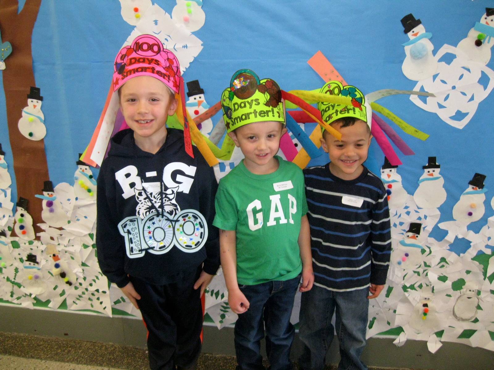 3 Students with 100 day crowns and necklaces.