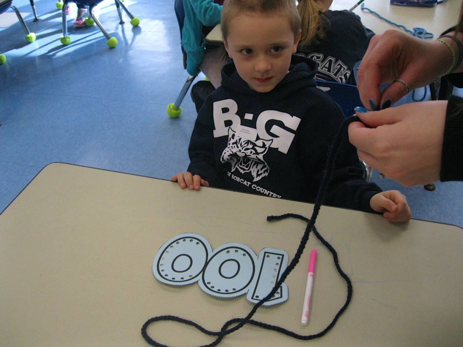 1 student sews a 100 necklace