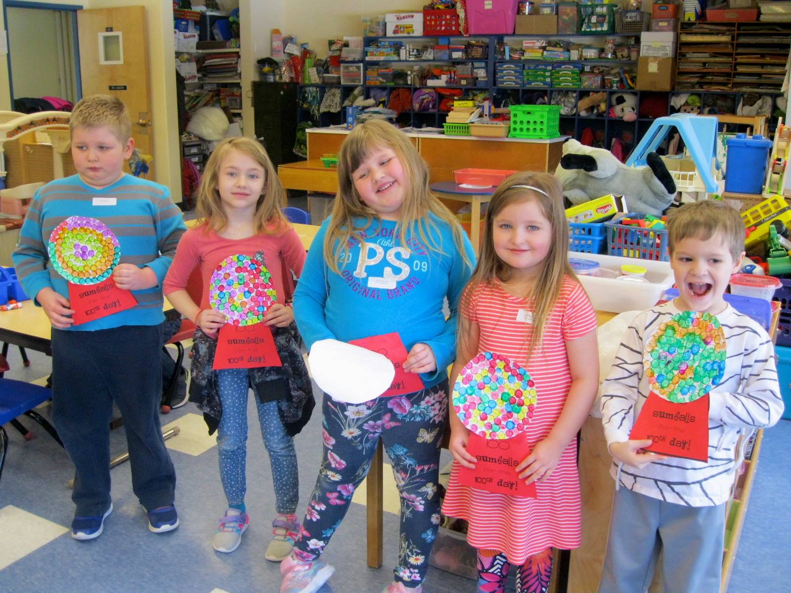 5 students with gum ball projects.