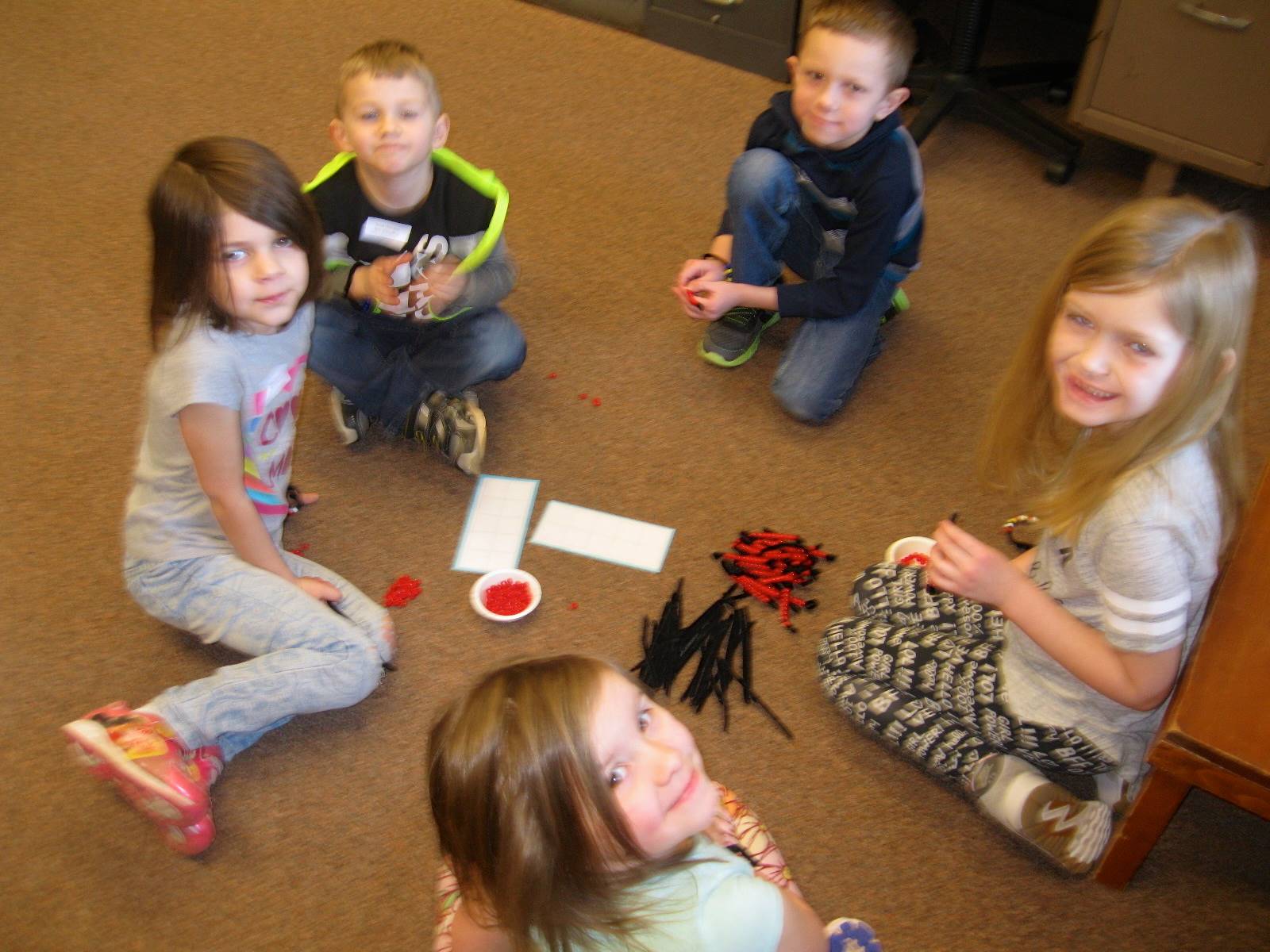 5 students create 100 wiggly worms.