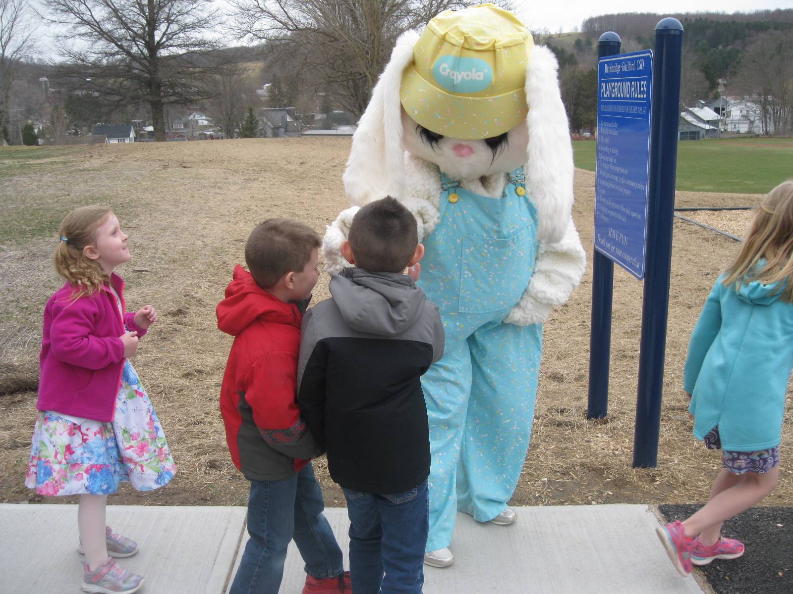 Easter Bunny with 3 students.
