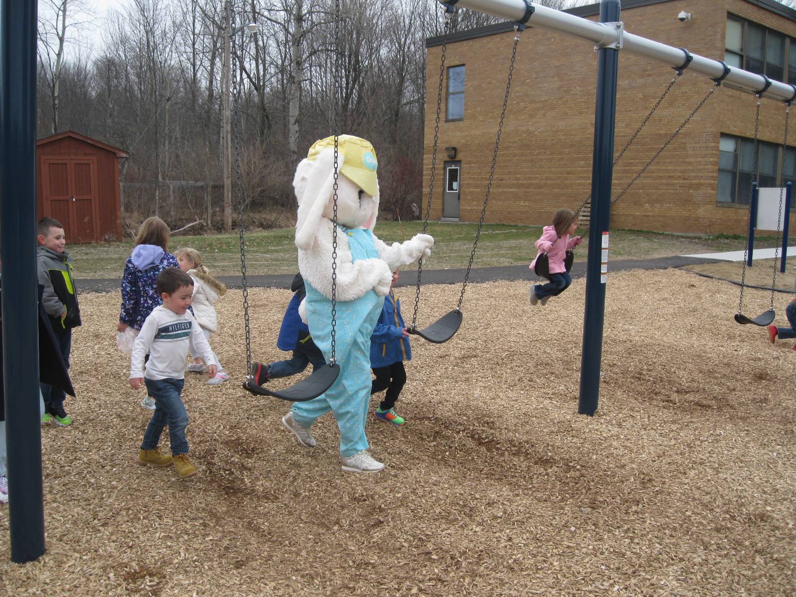 Easter Bunny swings with students!