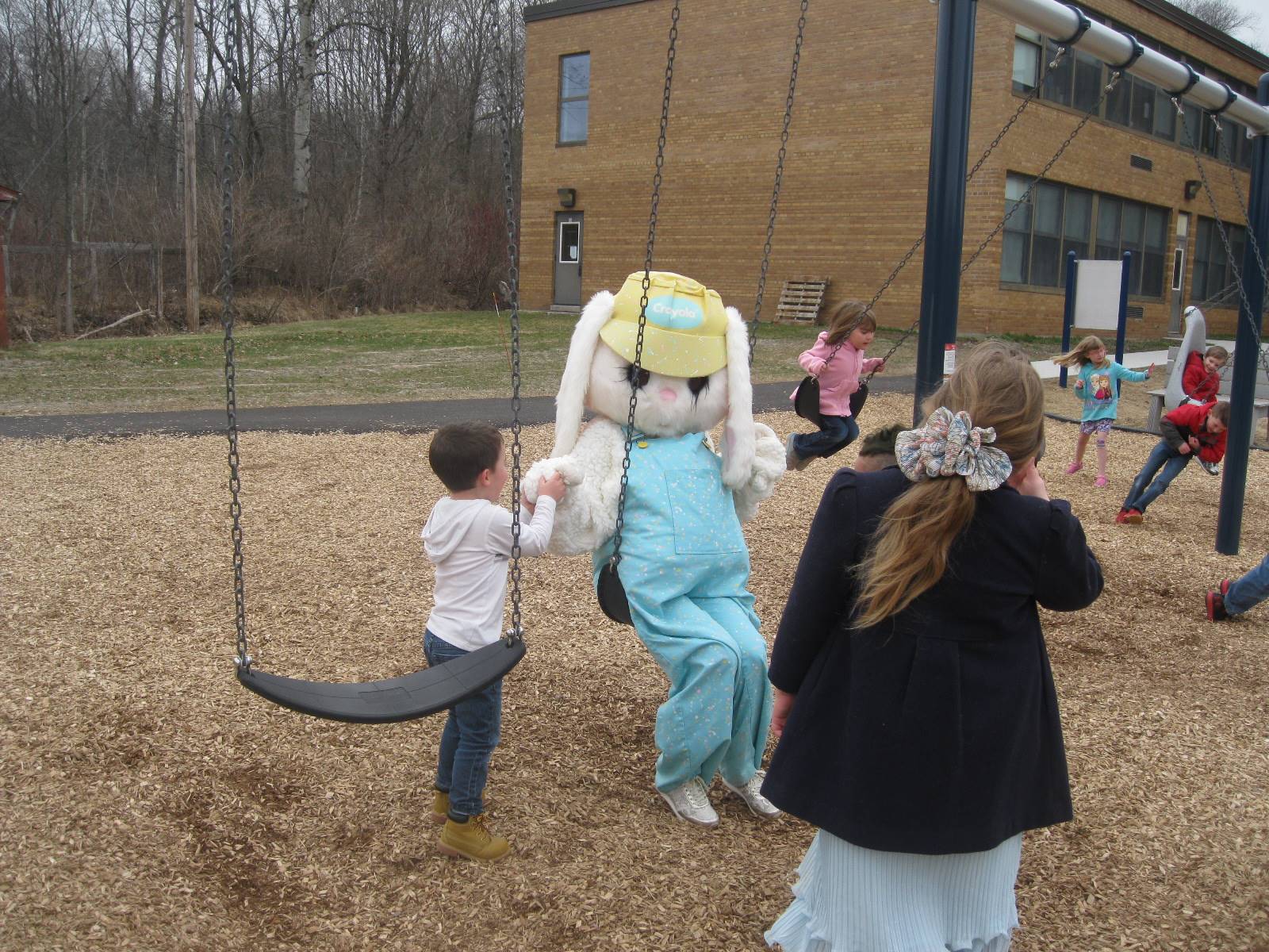 Easter Bunny swings with students!