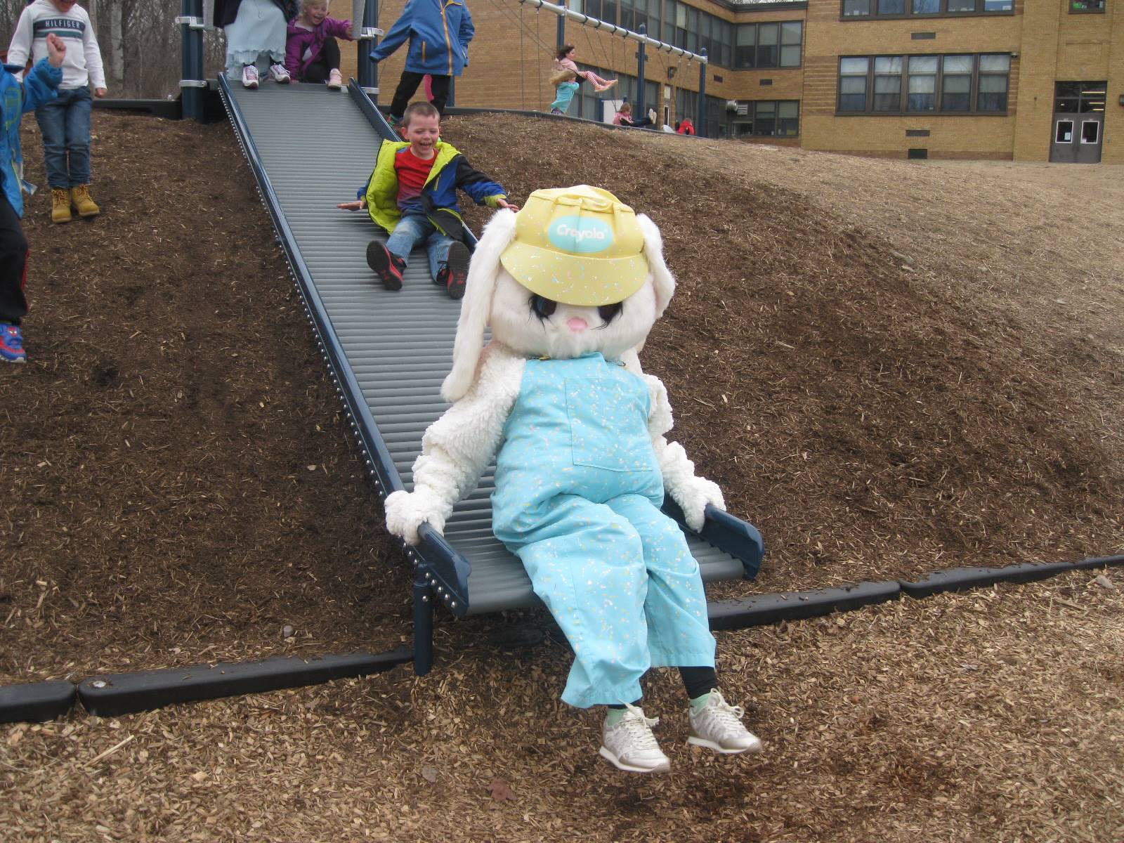 Easter Bunny and students slide together!