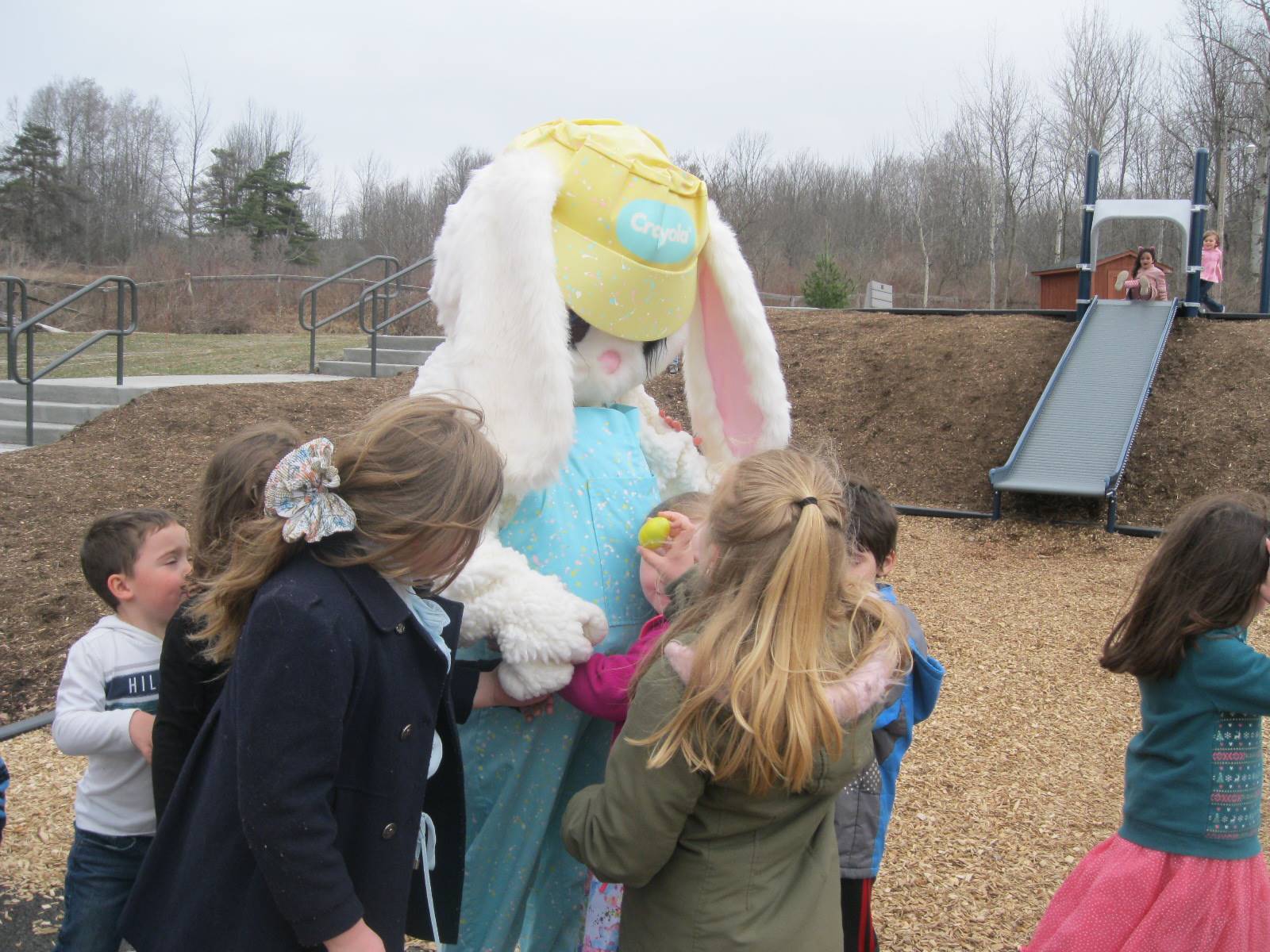 Students share their eggs with Easter Bunny.