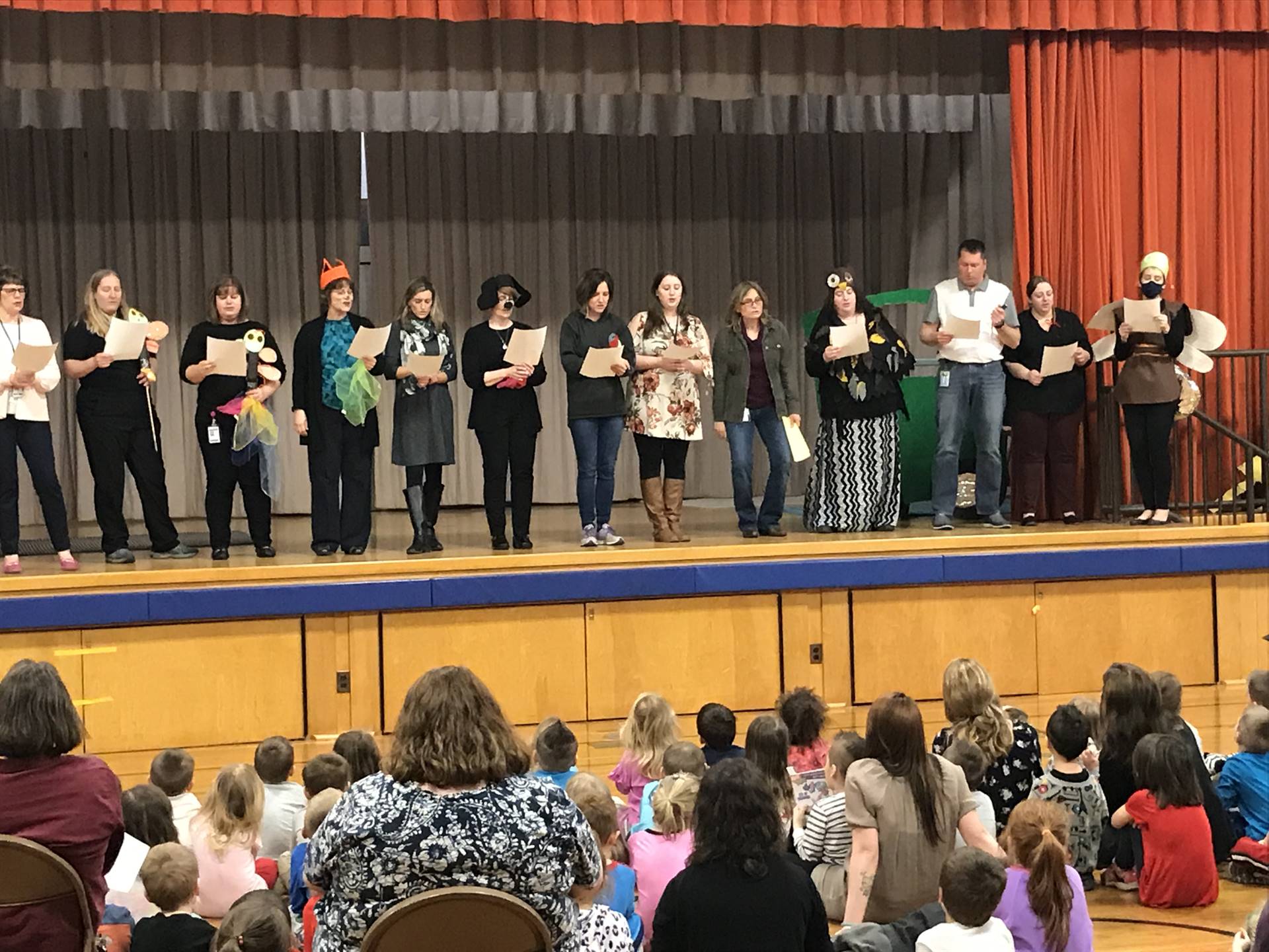 The staff cast as Lonely Firefly by Eric Carle