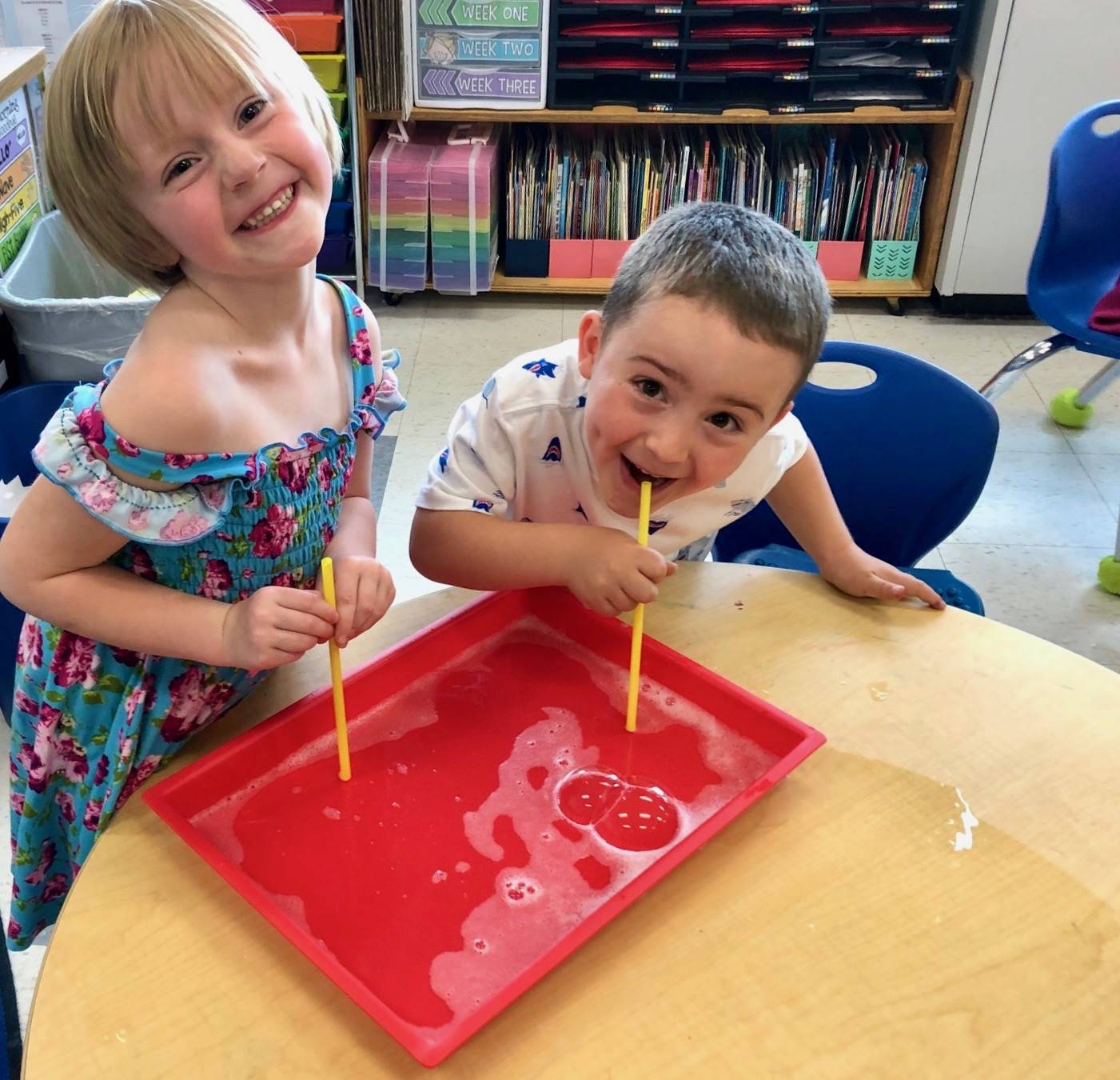 2 Students are excited to try bubbles.