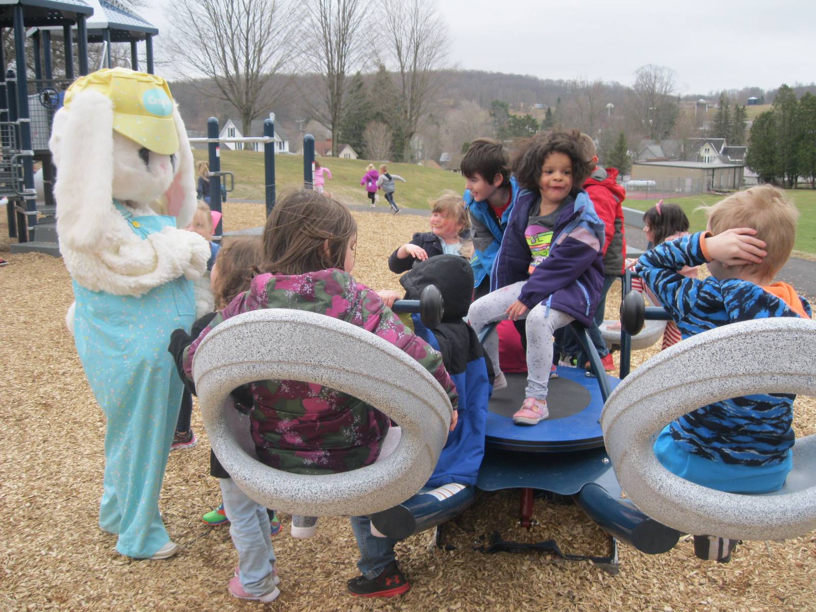 The Easter Bunny with a group of students.