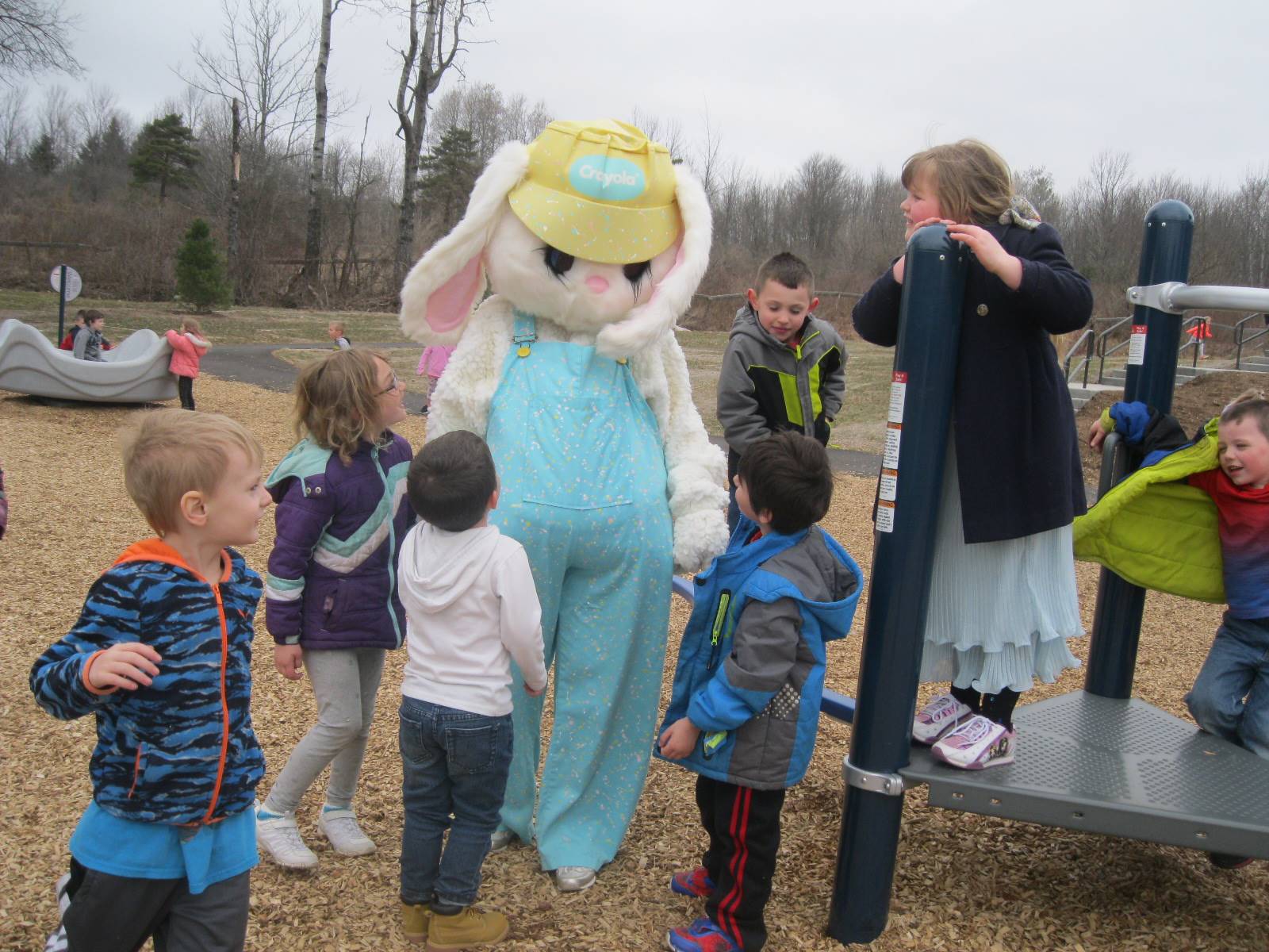 The Easter Bunny with a group of students.