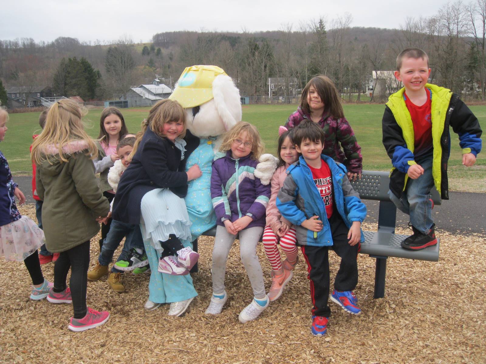 The Easter Bunny with a group of students.