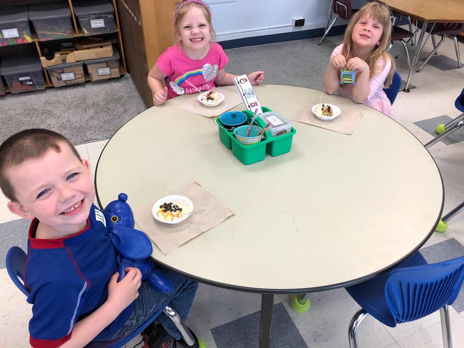 3 students enjoy a hard earned ice cream party