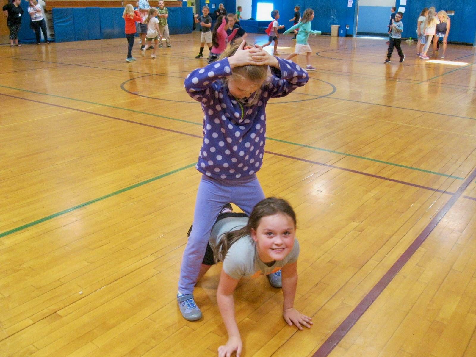 2 students play Monster mud tag