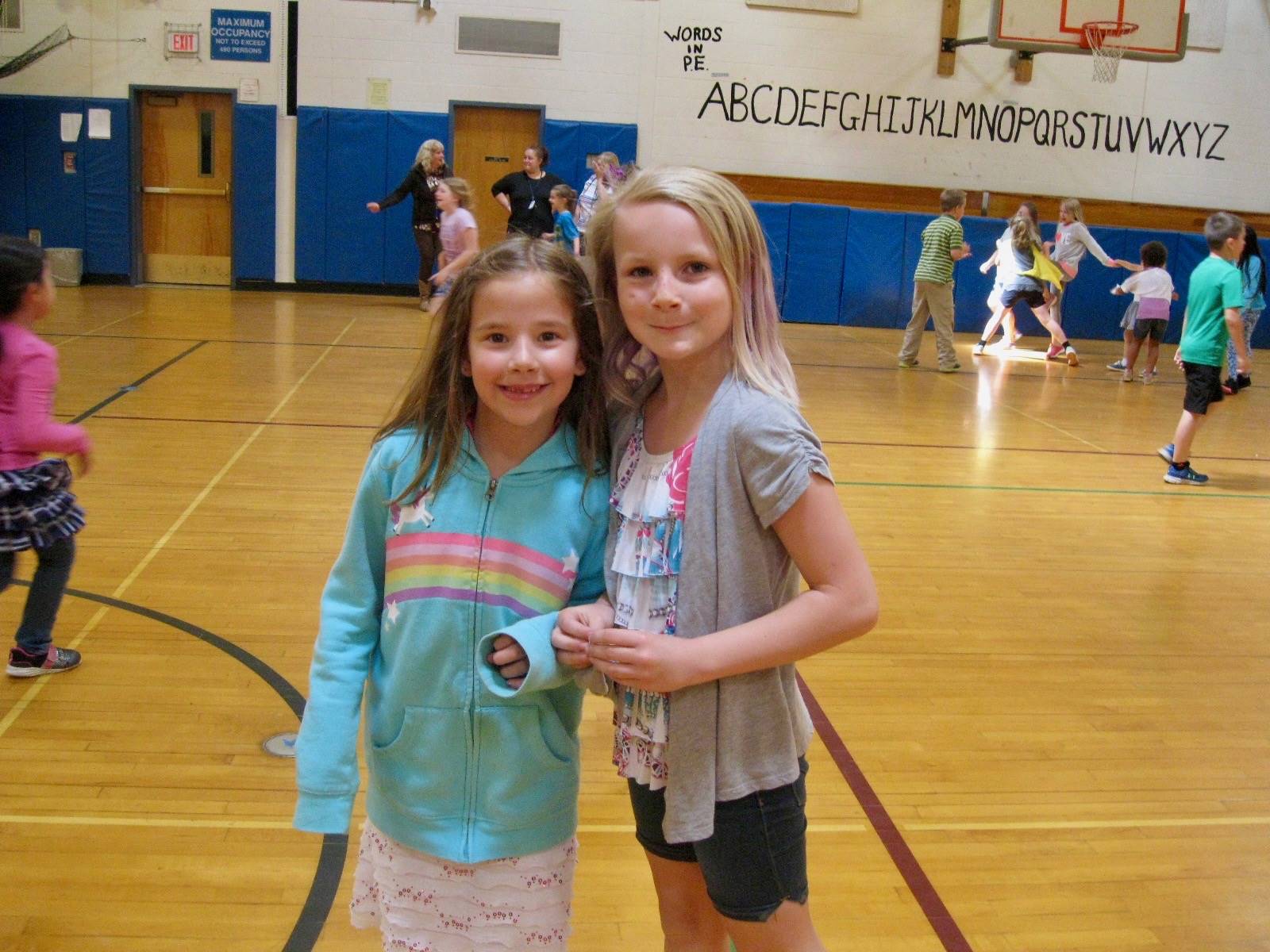 2 students playing PE.