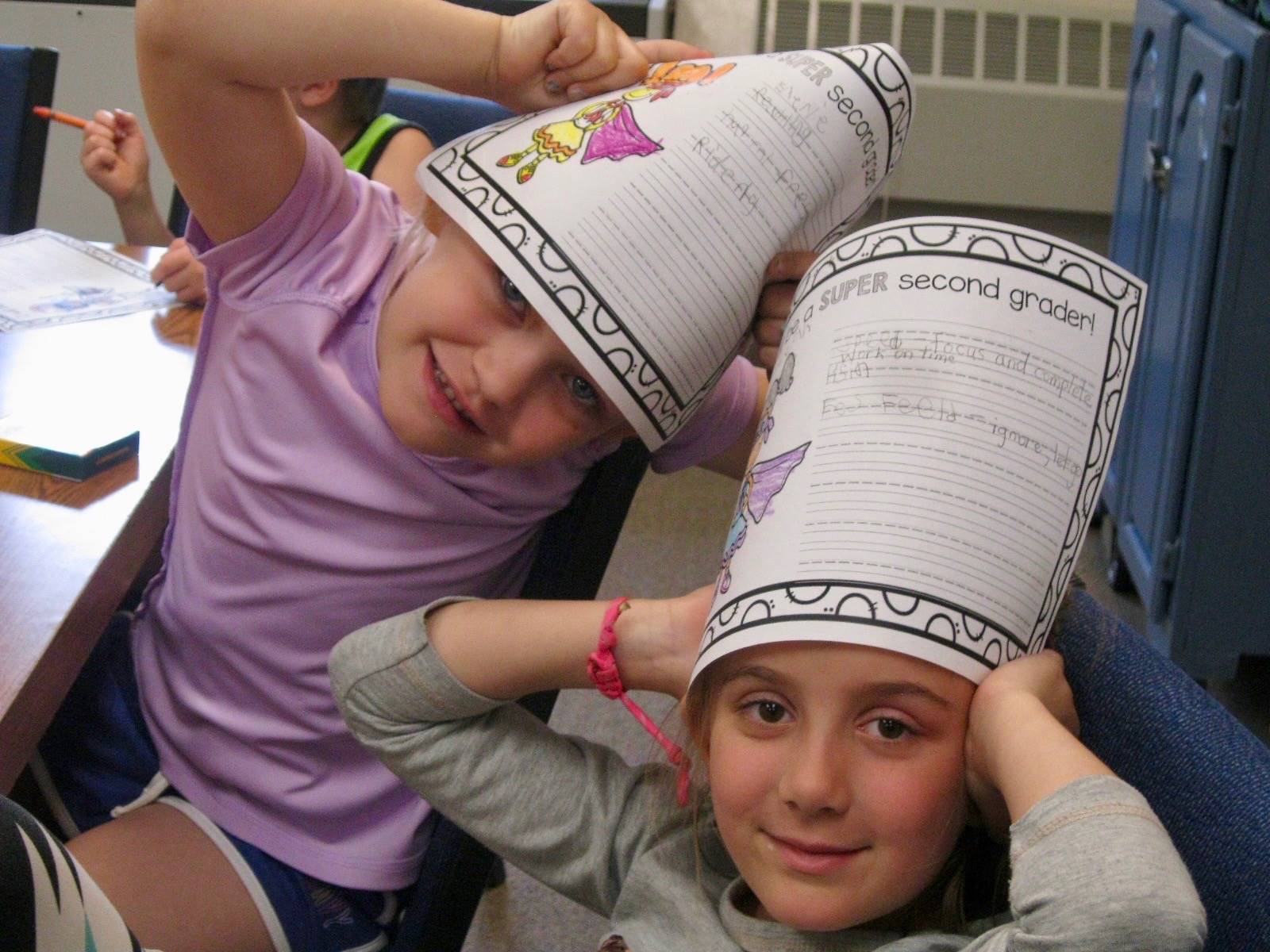 2 students show off superhero student powers.