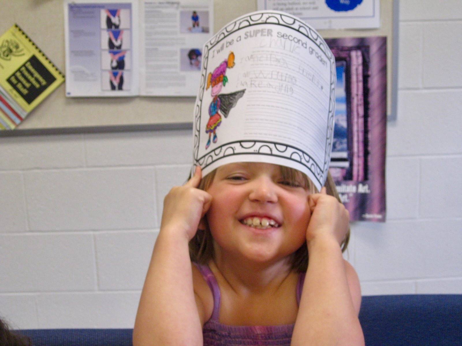 A student shows off superhero student powers.