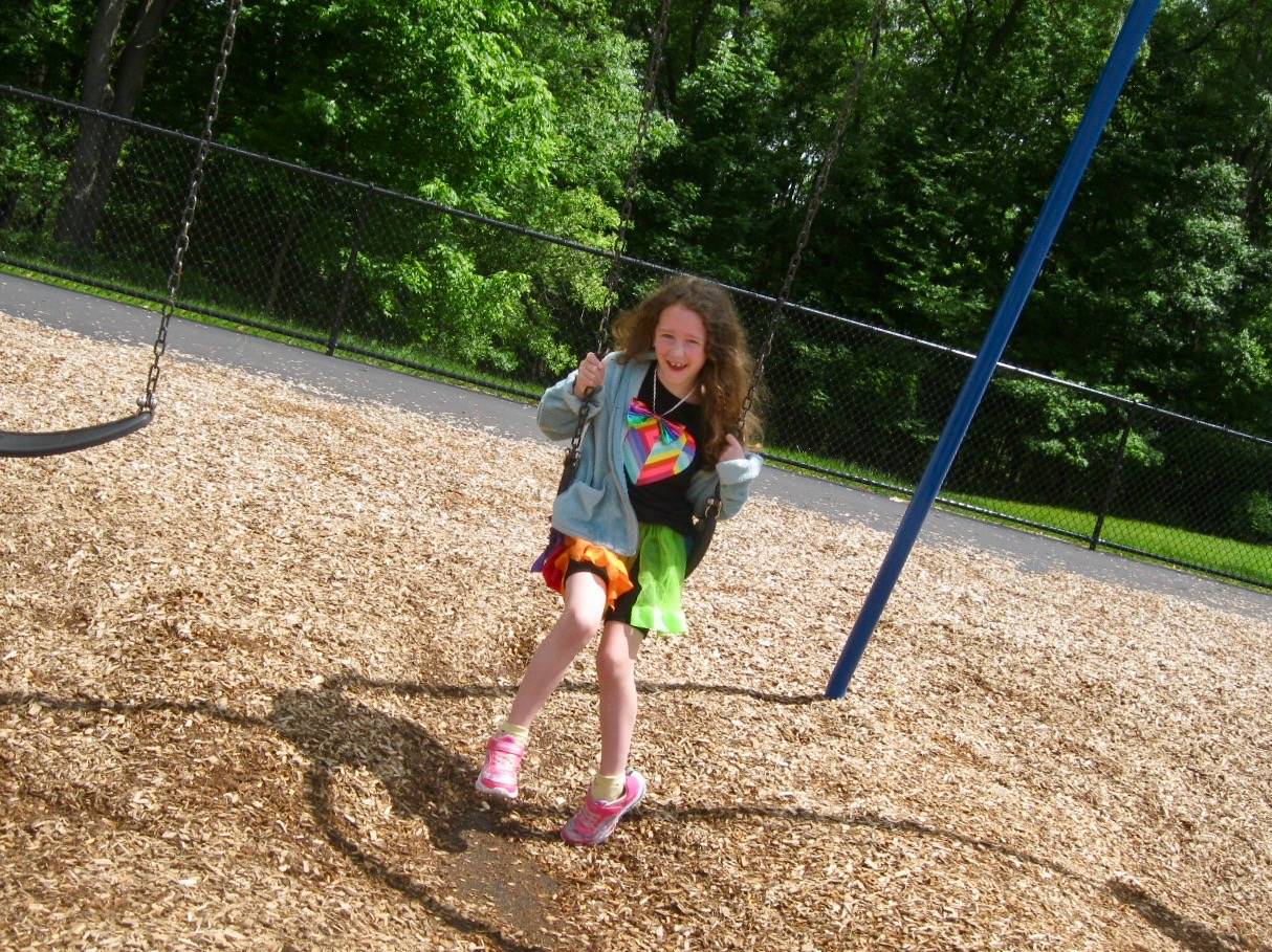 A student swinging.