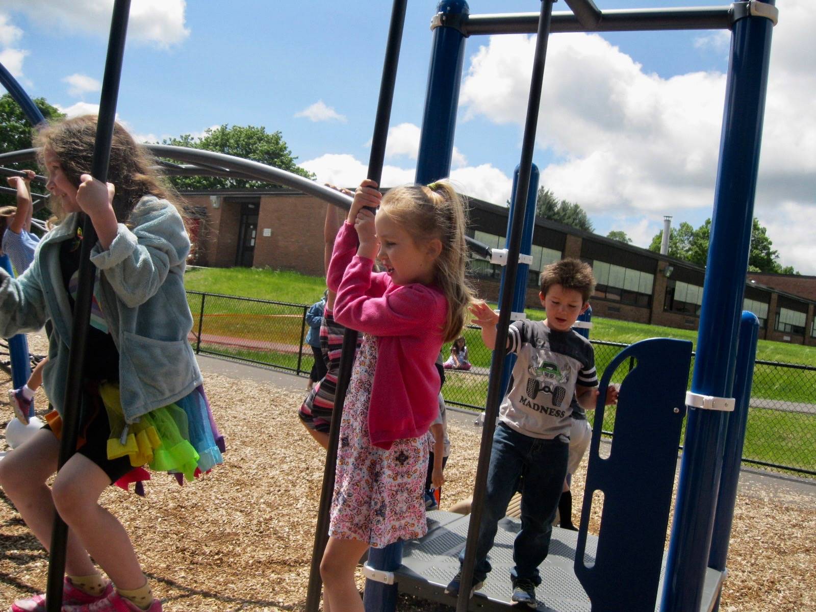 Students playing on playground.