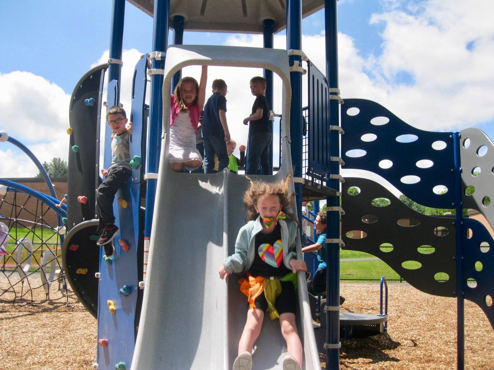 Students playing on playground.