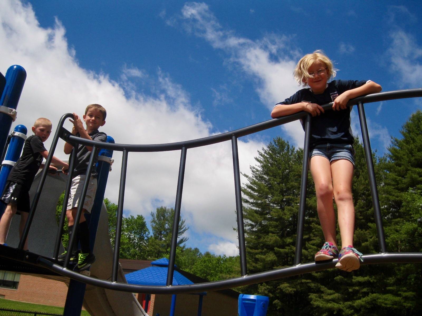 Students playing on playground.