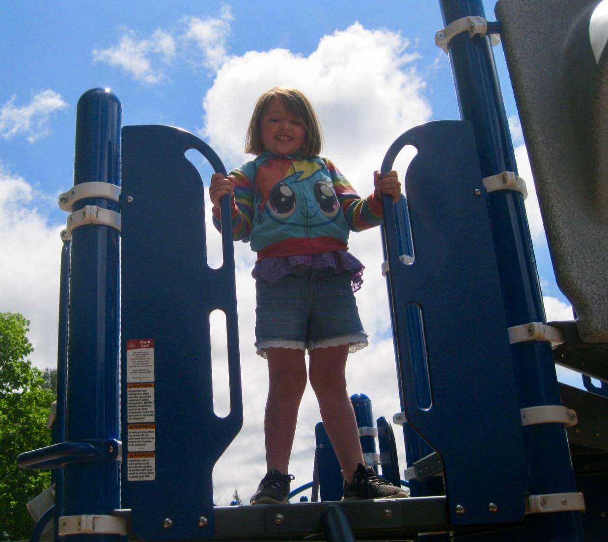 A student plays on playground.