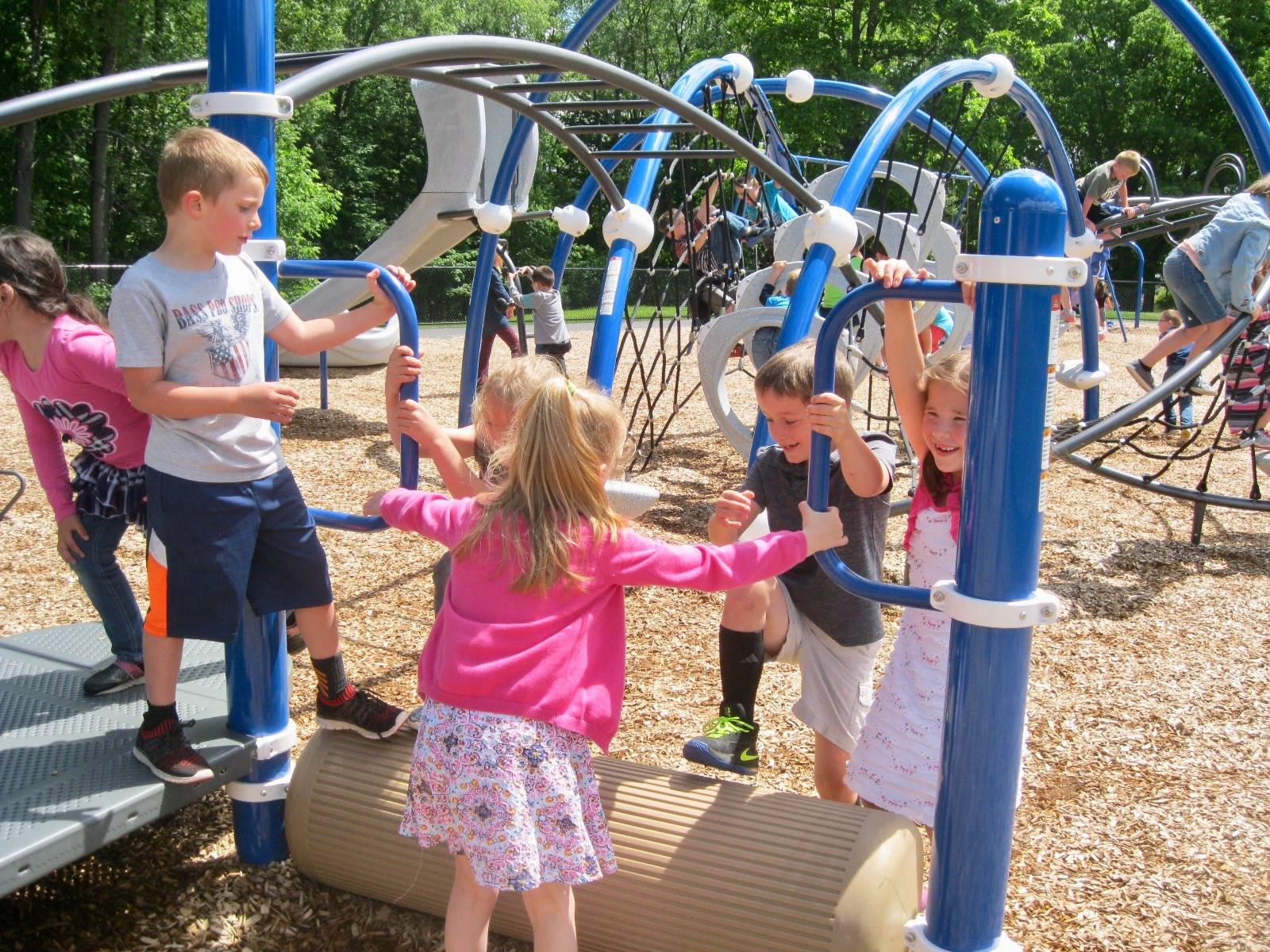 Students playing on playground.