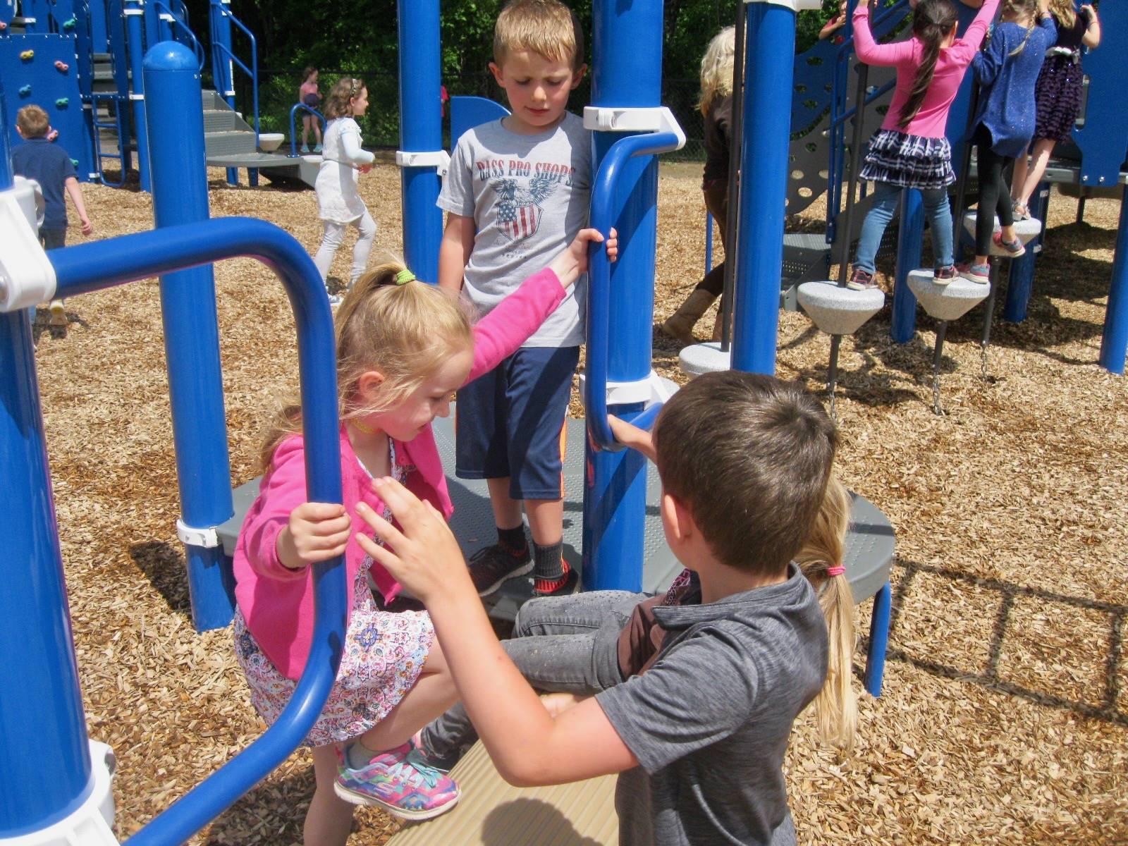 Students playing on playground.