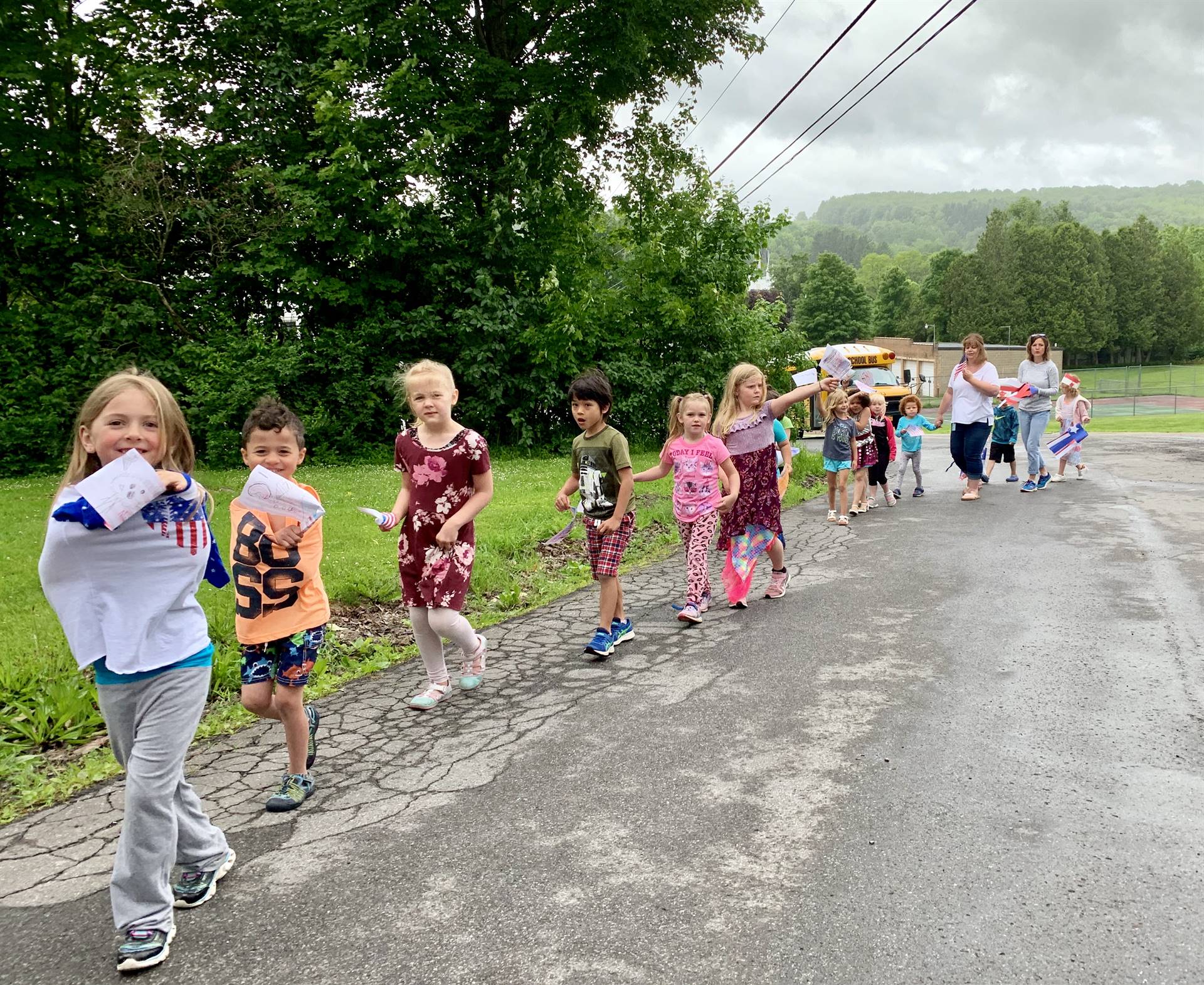 Students celebrate flag day parading around the school.