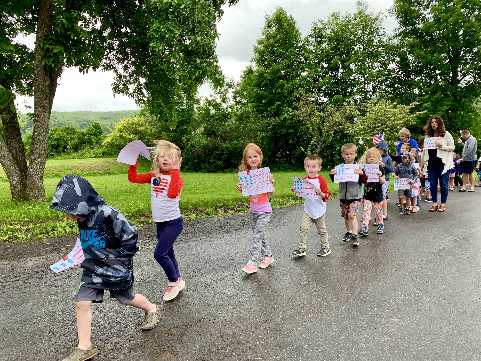 Students hold flag projects and march.