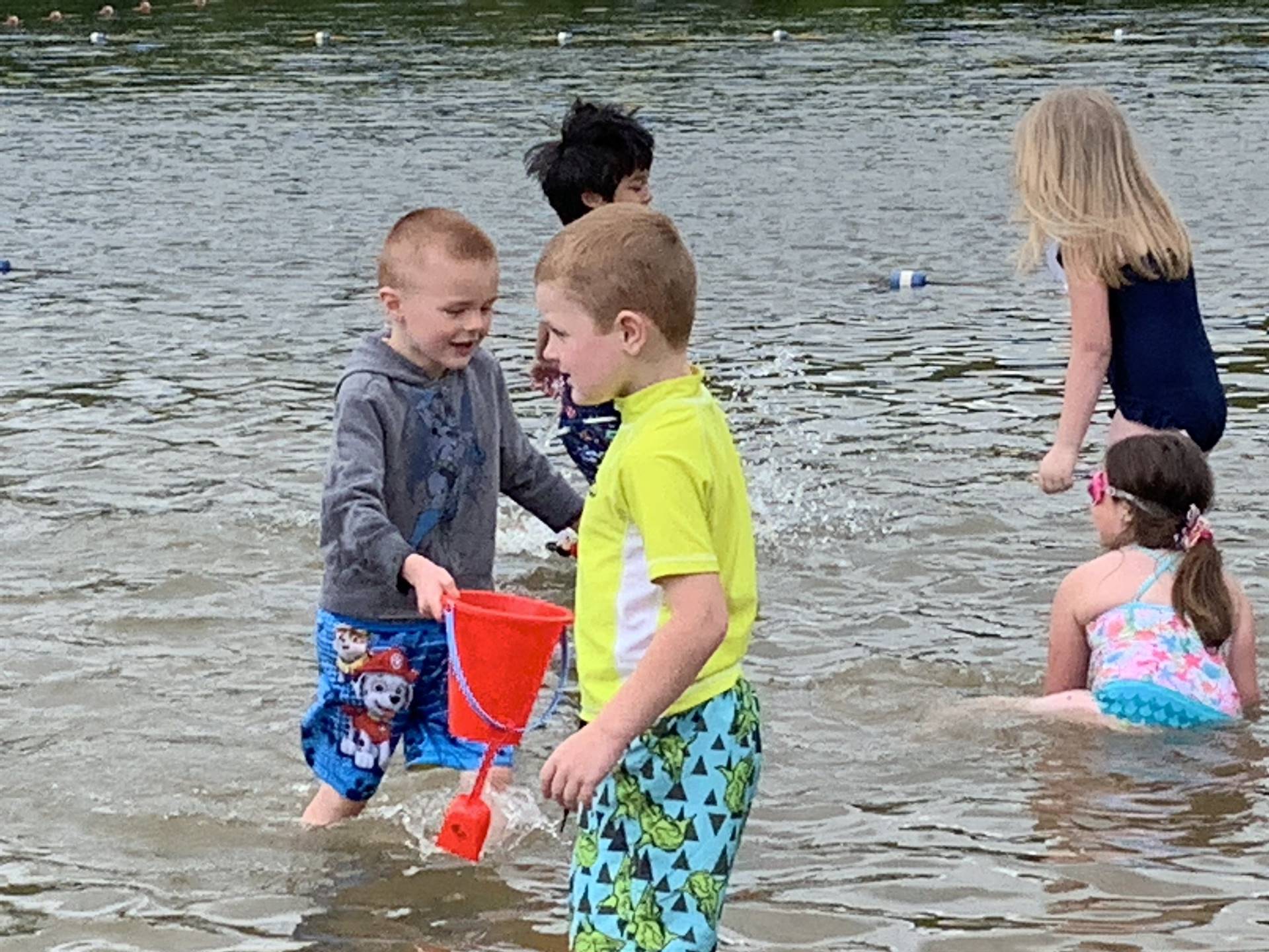 Students play in water.