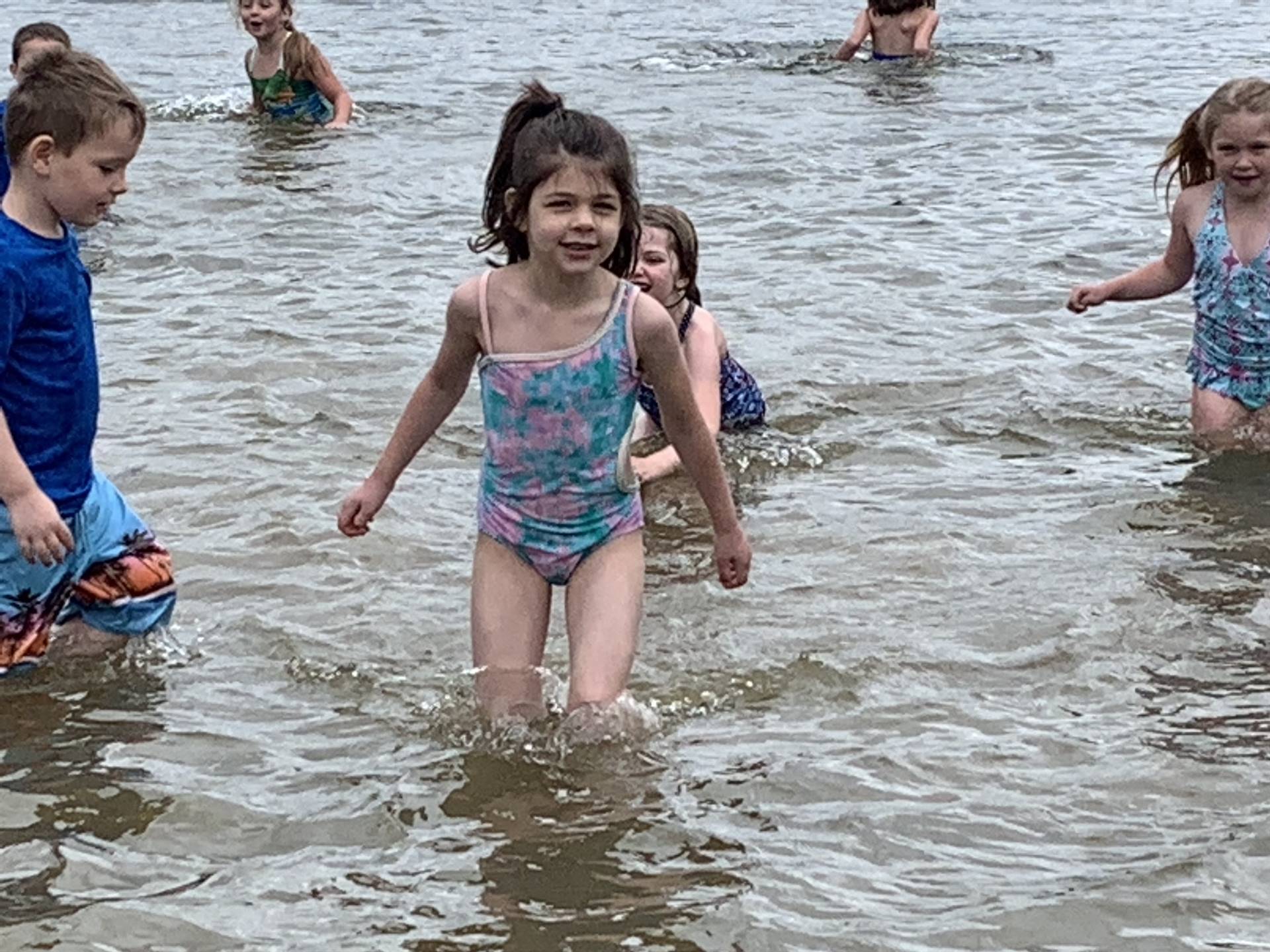 Students play in water.