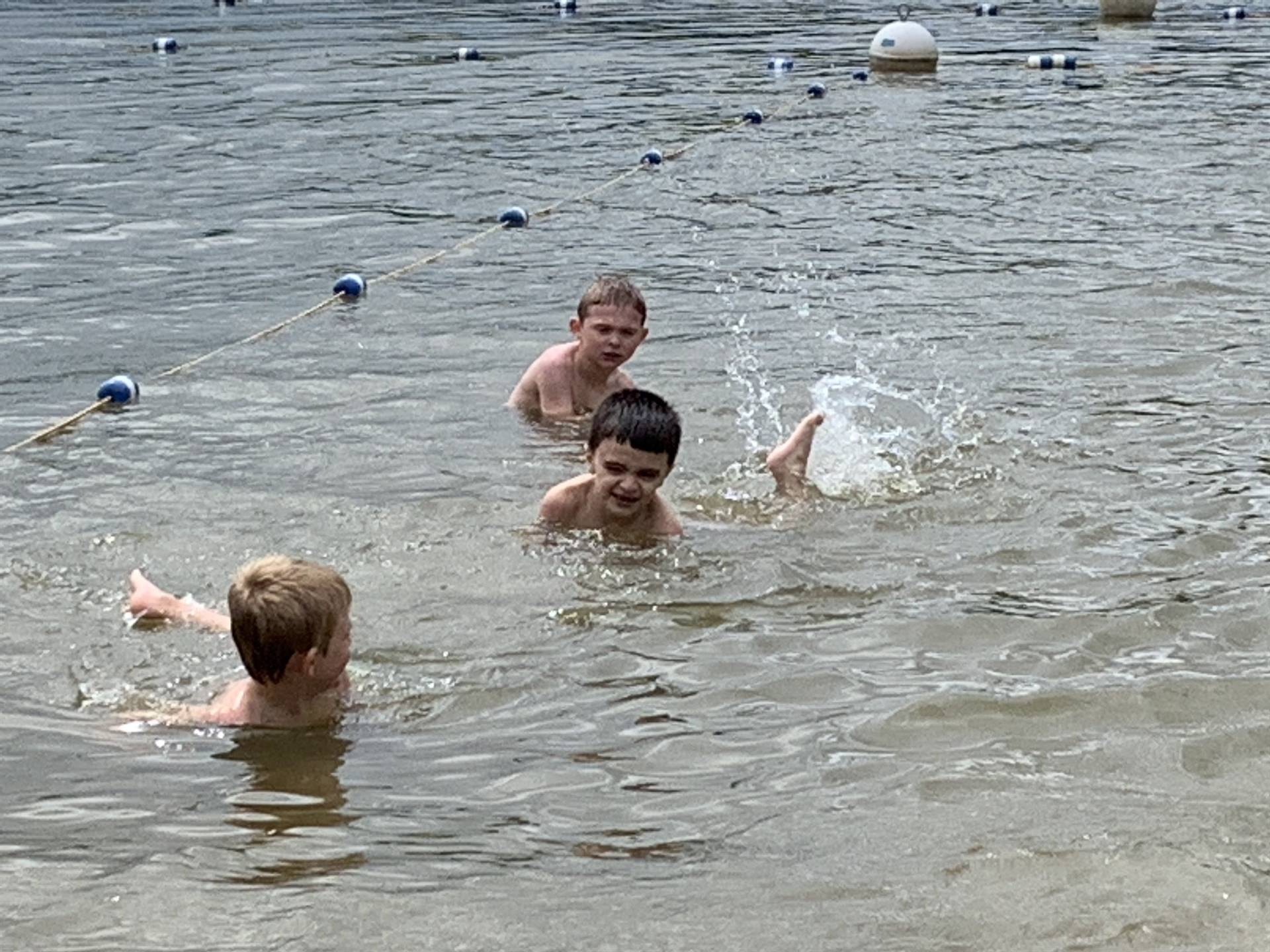 2 students swim.