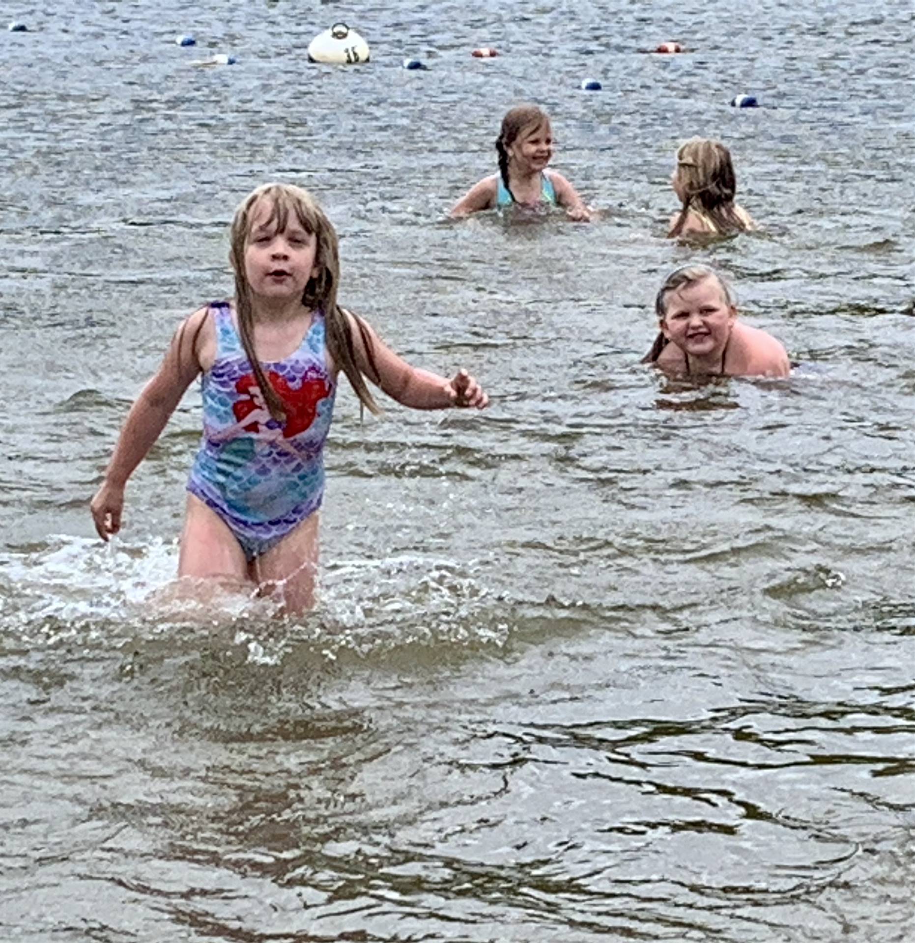 Students play in water.