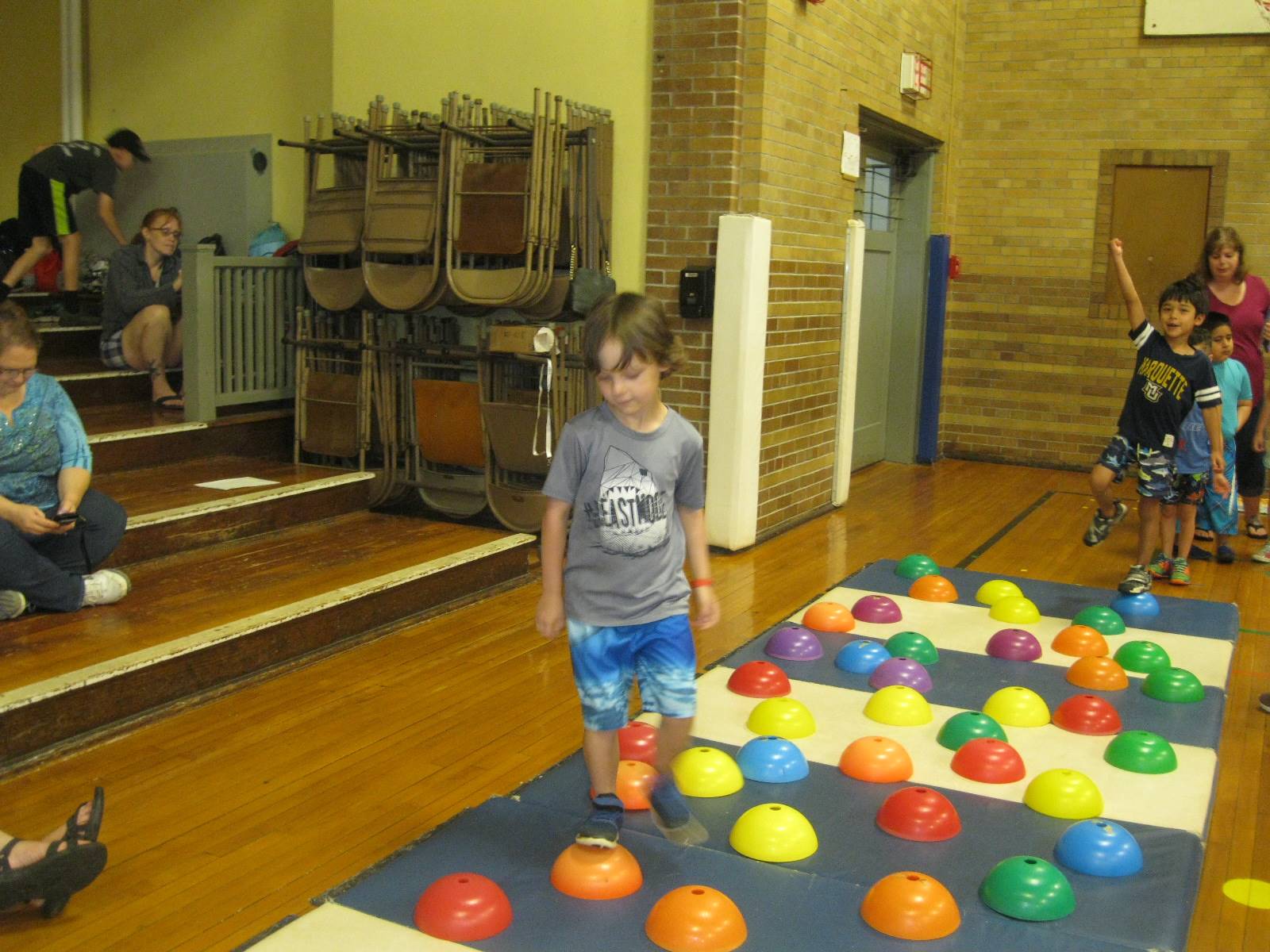 Student stepping across "stones"