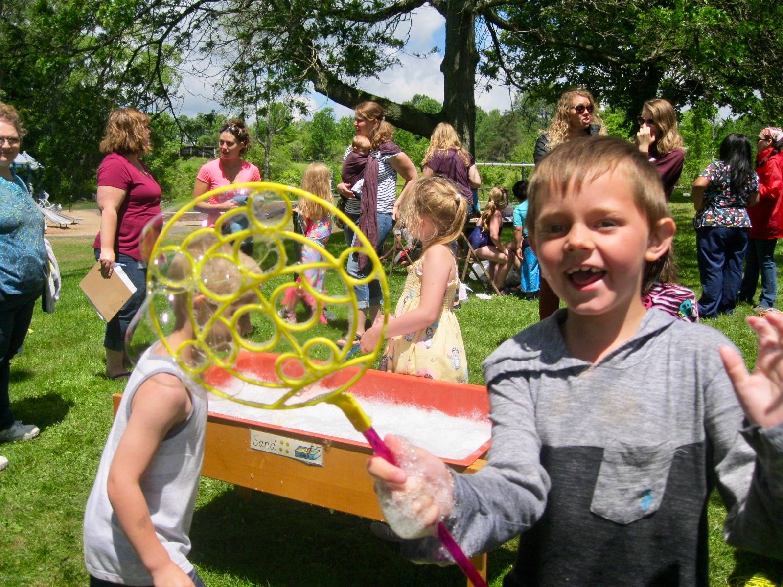 A student with a bubble wand.