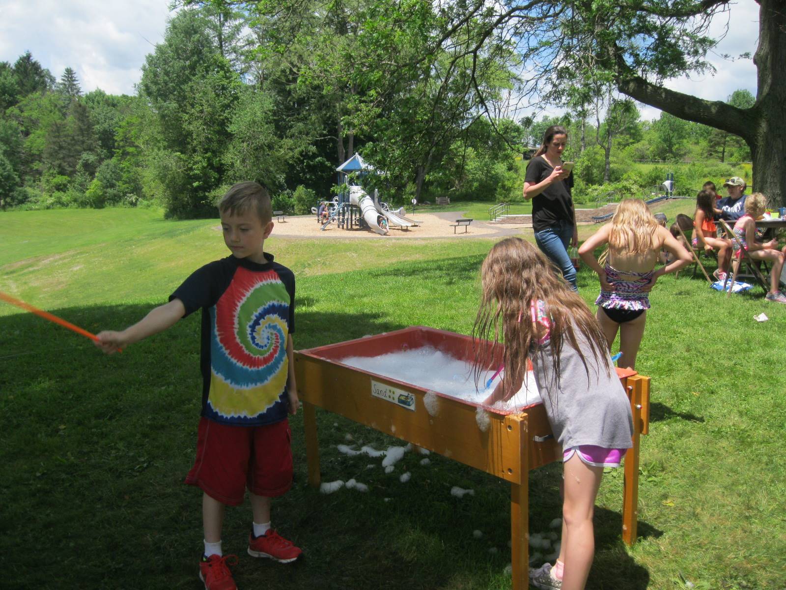 2 Students play with bubbles.