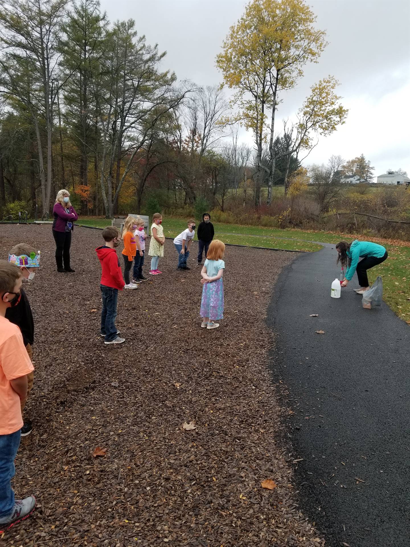 students watch as rocket is launched.