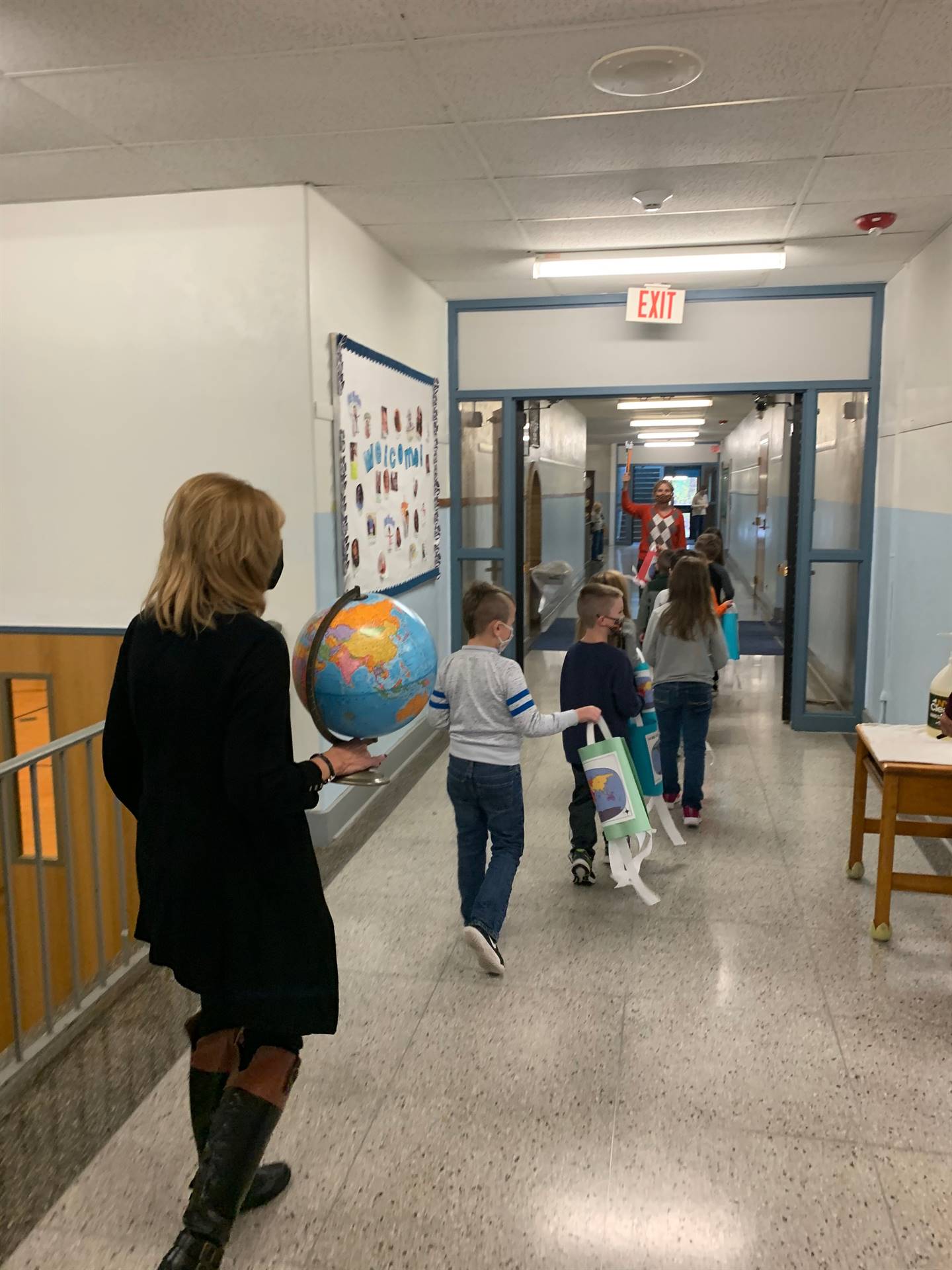 Students walking in hall for world parade