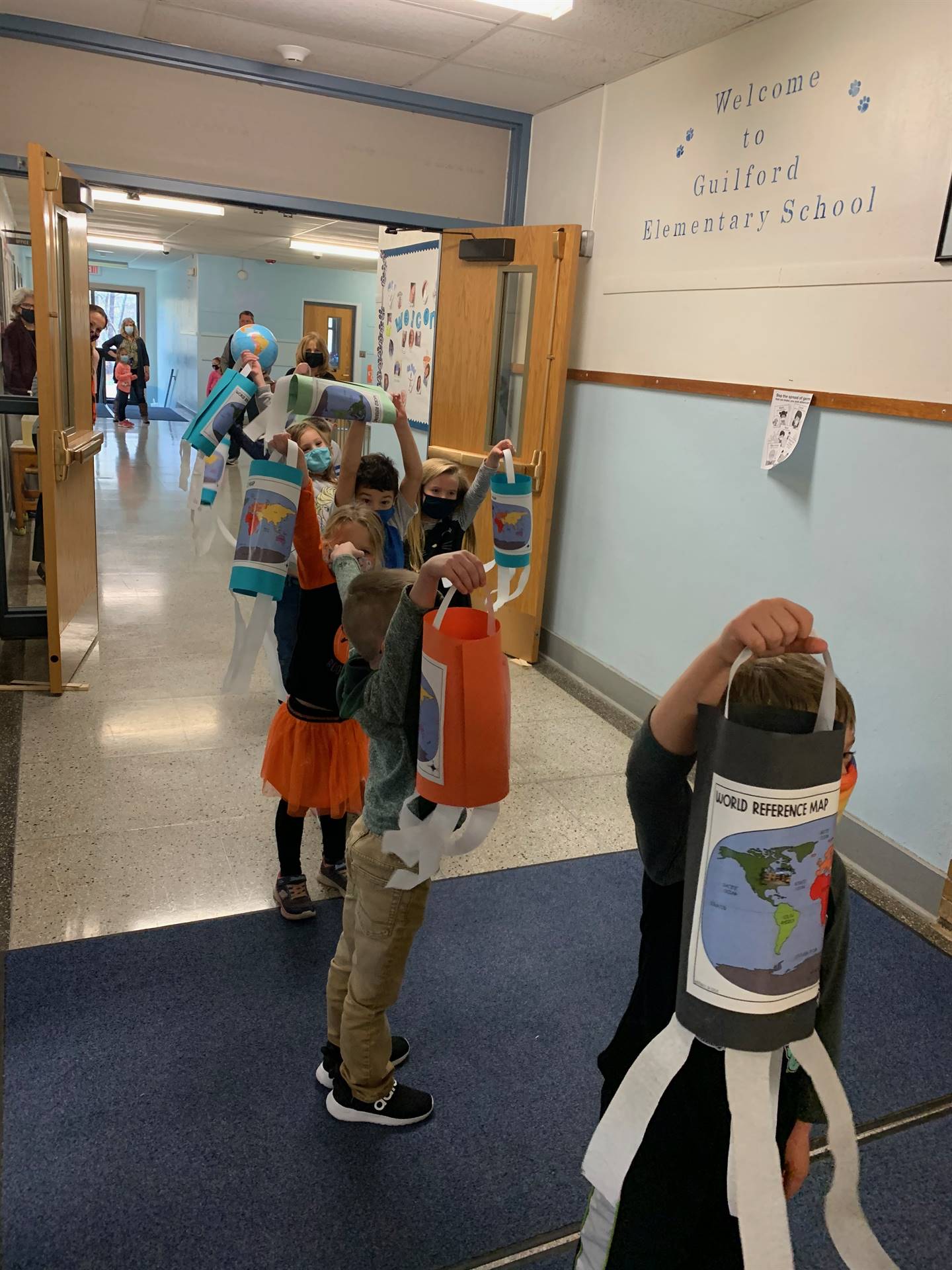 Students in hallway for world parade