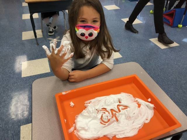 1 student writes in shaving cream!