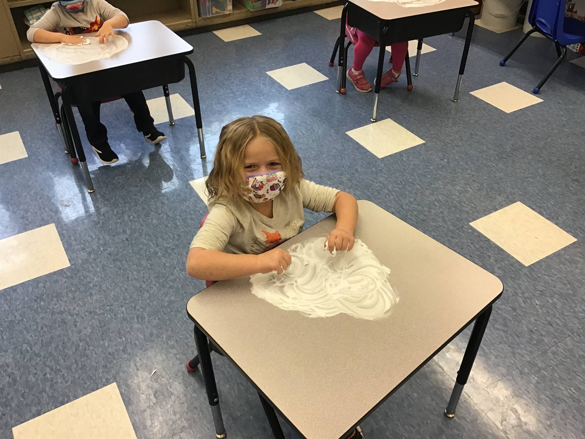 student draws emotions in shaving cream!