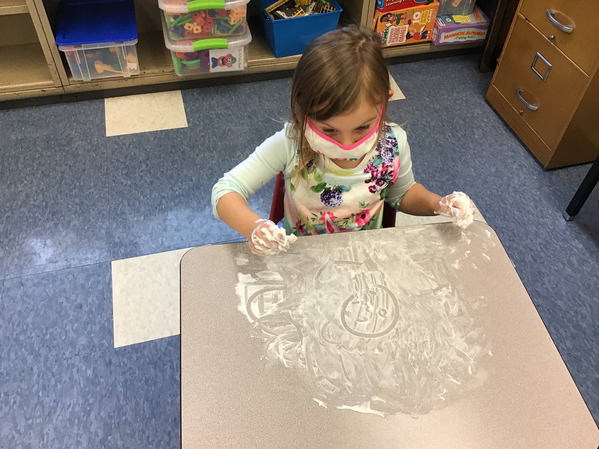 student draws emotions in shaving cream!