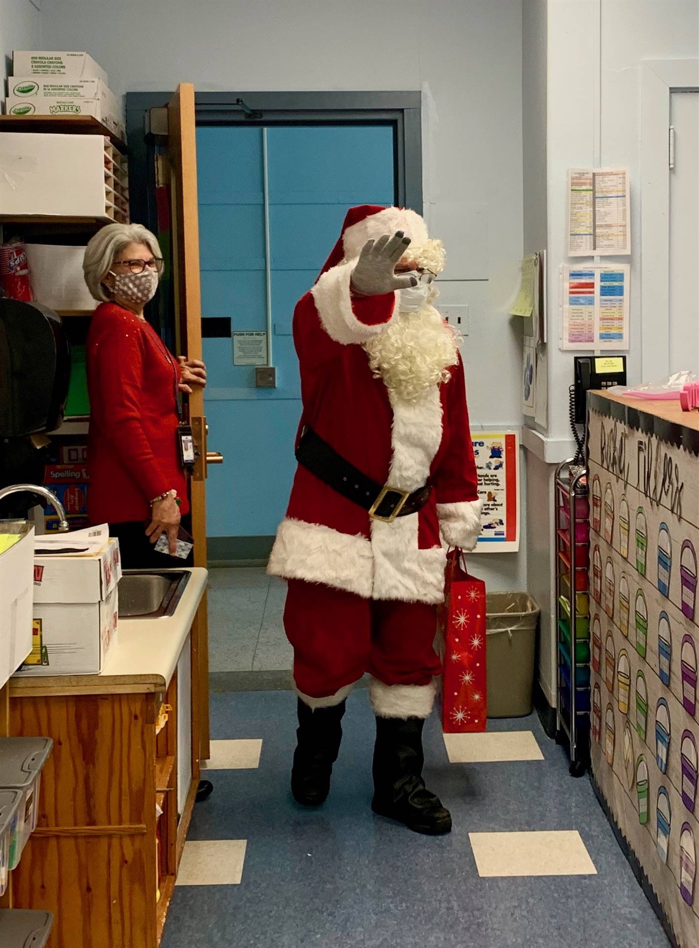 Santa and Mrs. Claus enter a classroom!