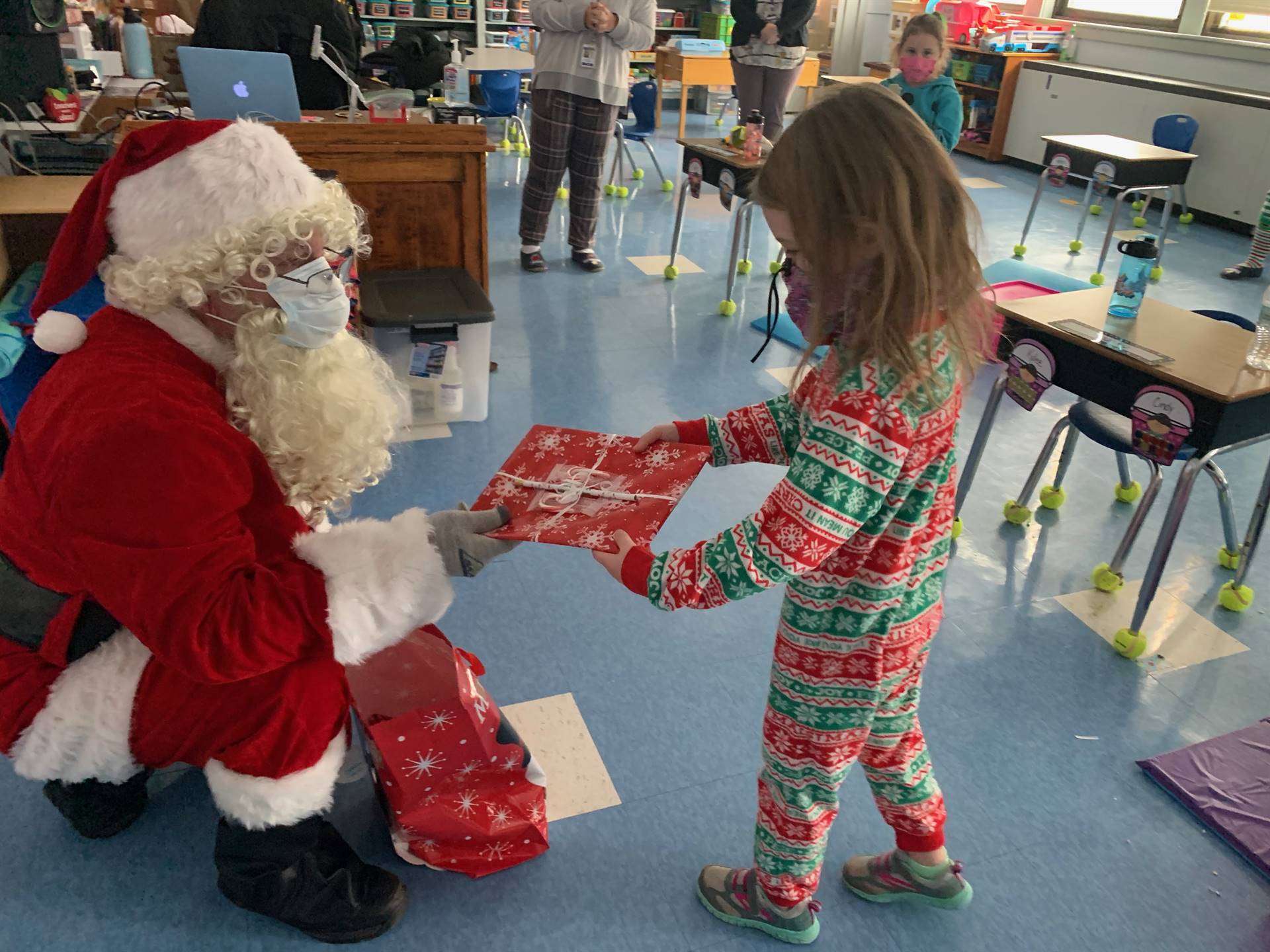 Santa and a student together.