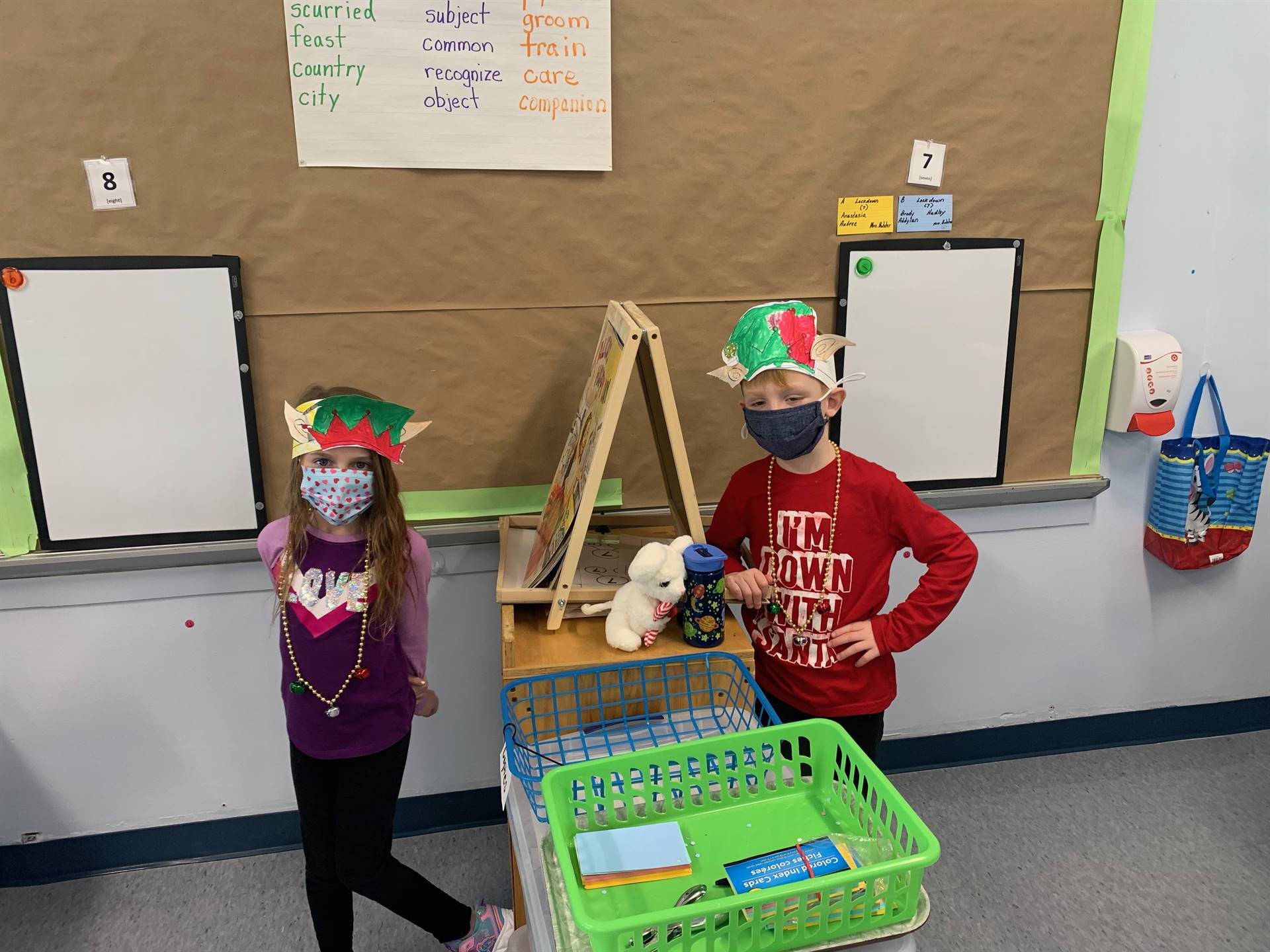 2 student elves in a classroom.