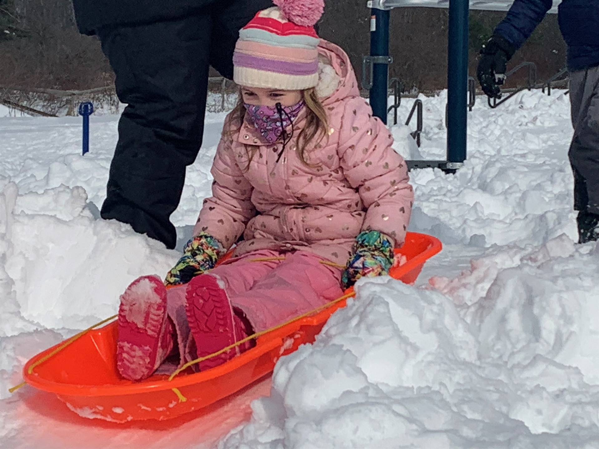 a student is Sledding.