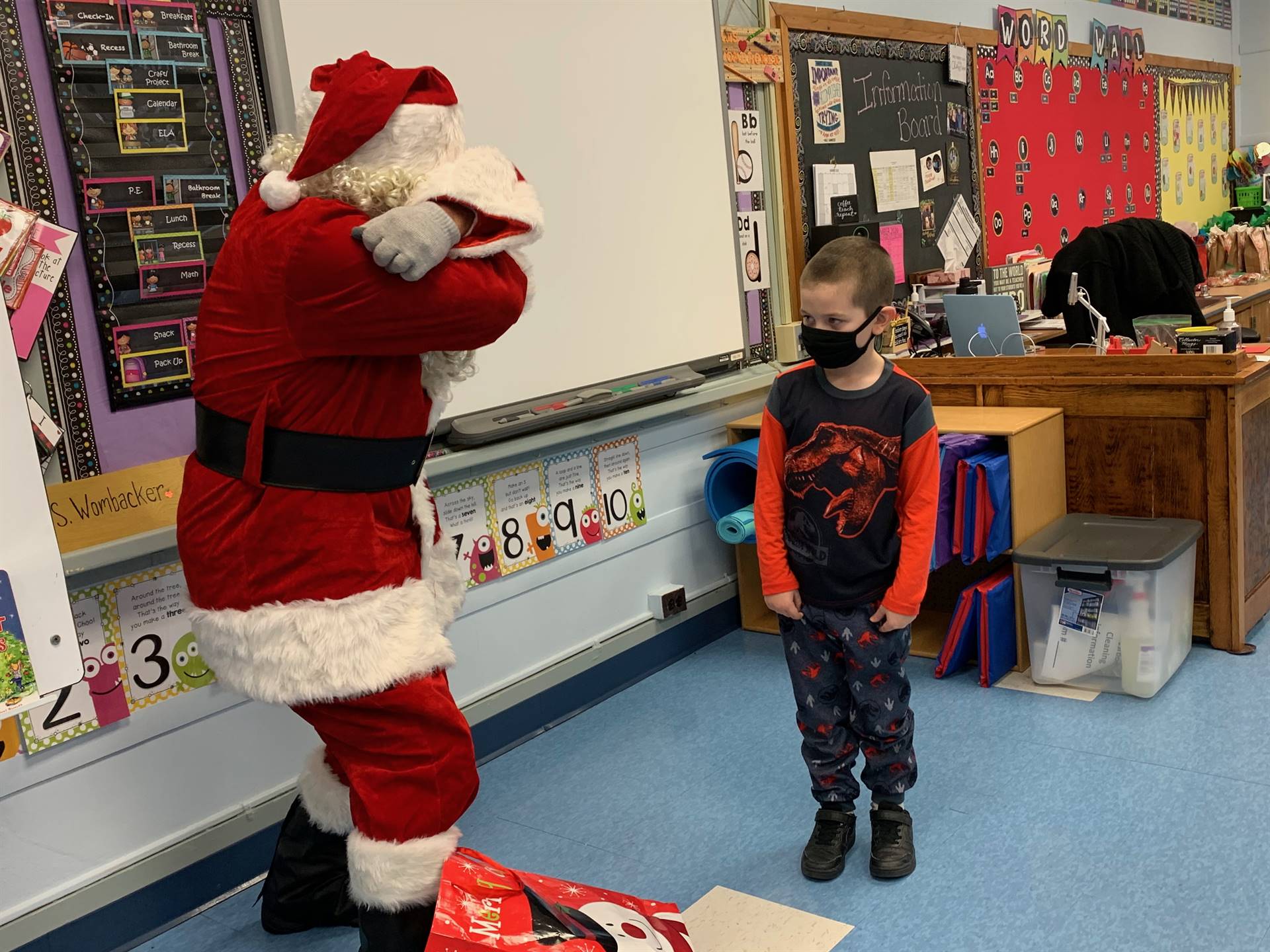 Santa shows how a dinosaur roars!