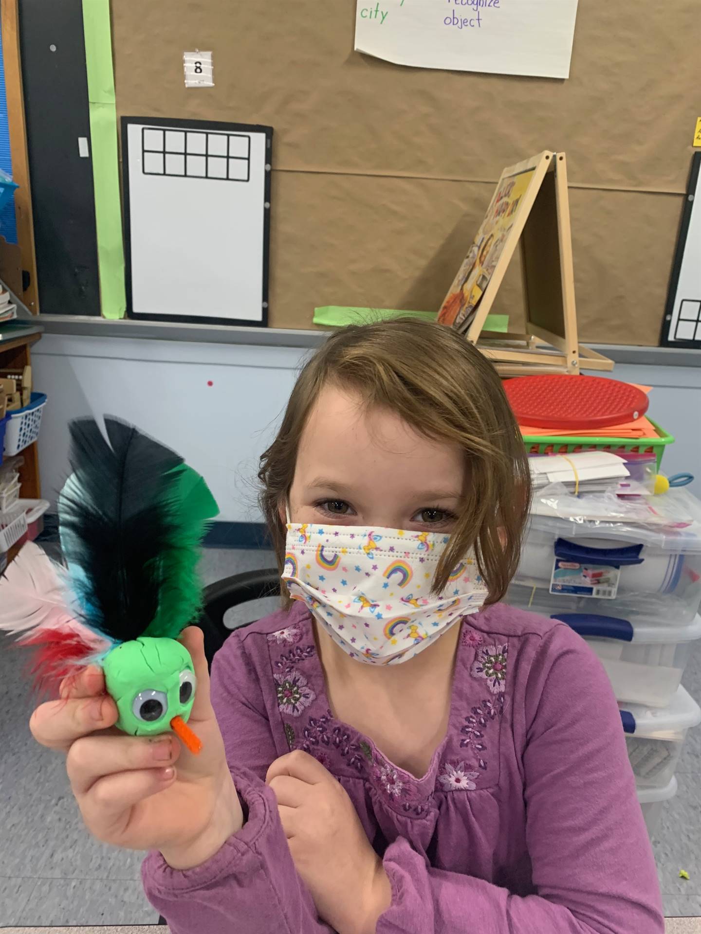 Student proudly displays their playdo turkey!