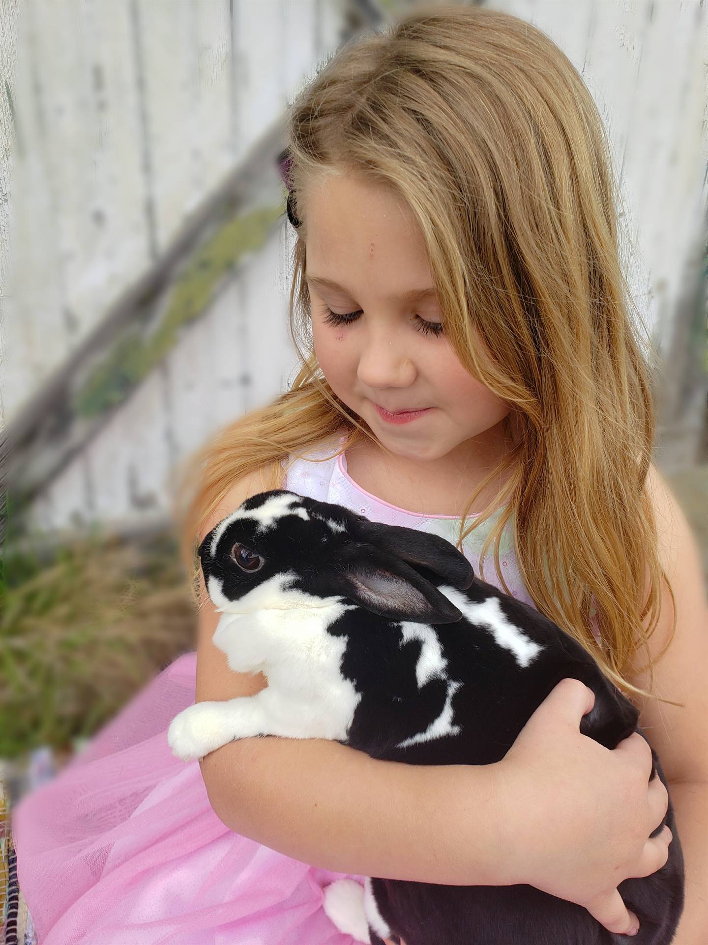 A child with her rabbit