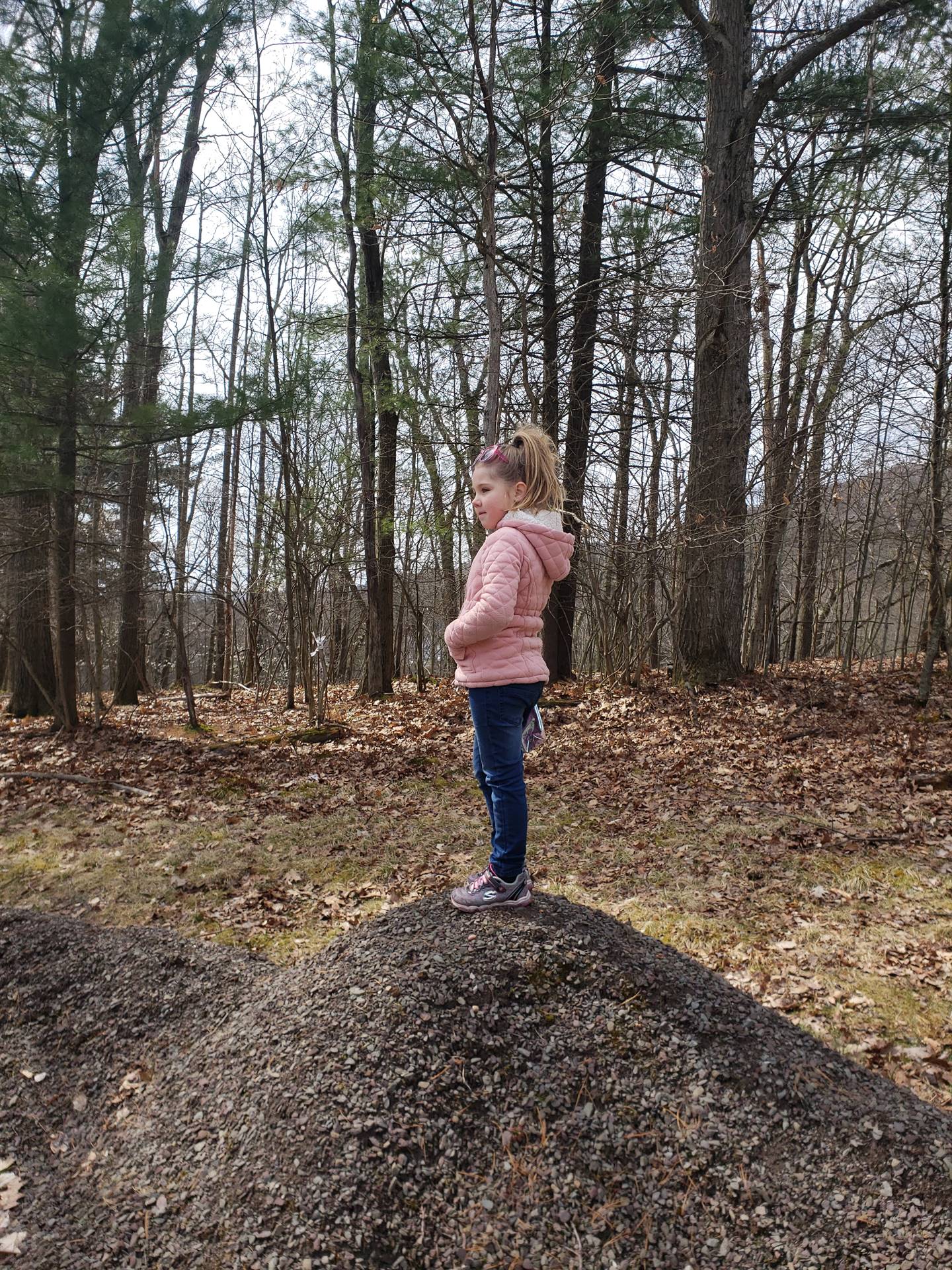 A child in the woods.